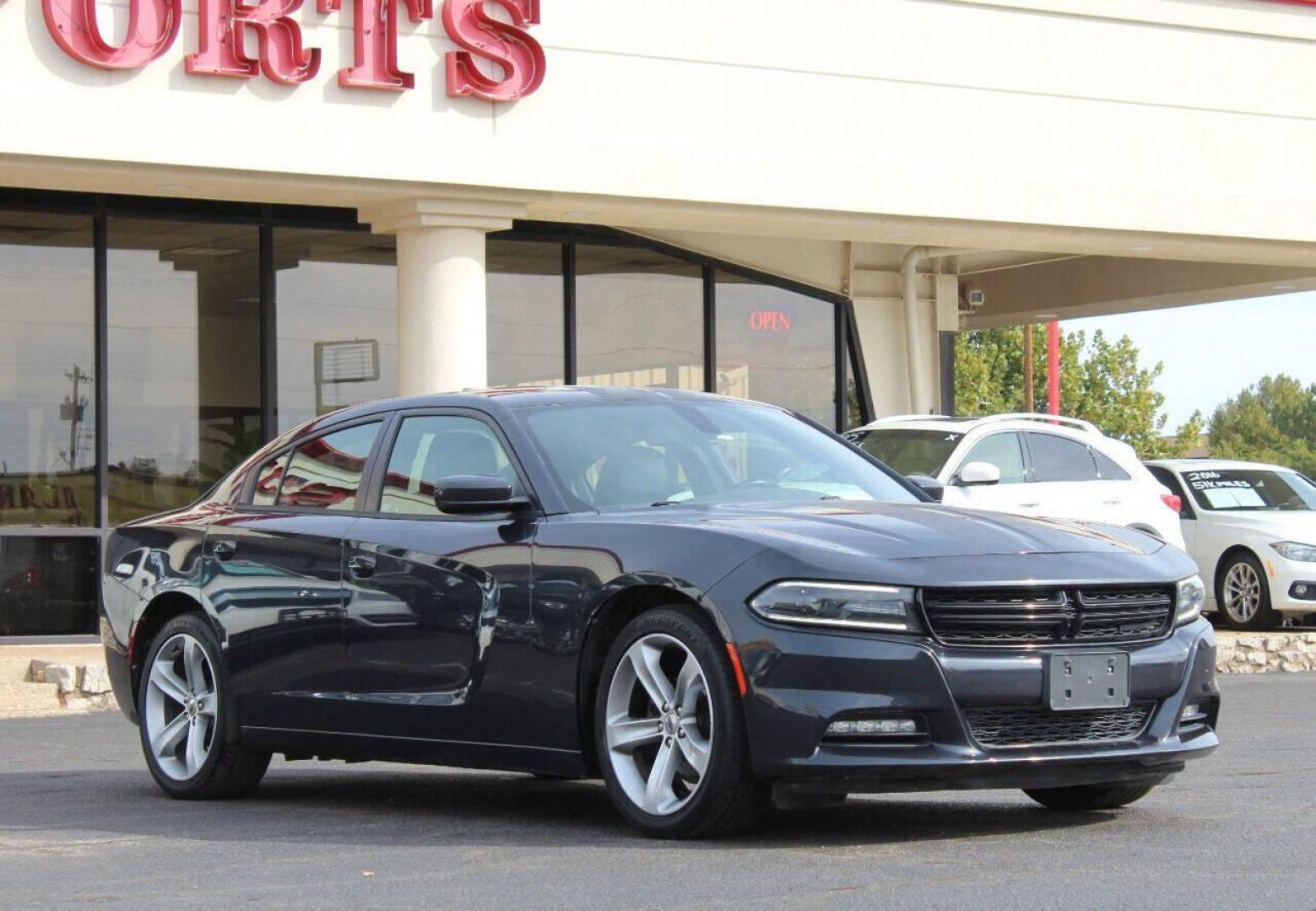 2017 Charcoal Dodge Charger SXT (2C3CDXHG4HH) with an 3.6L V6 DOHC 24V engine, 8A transmission, located at 4301 NW 39th , Oklahoma City, OK, 73112, (405) 949-5600, 35.512135, -97.598671 - NO DRIVERS LICENCE NO-FULL COVERAGE INSURANCE-NO CREDIT CHECK. COME ON OVER TO SUPERSPORTS AND TAKE A LOOK AND TEST DRIVE. PLEASE GIVE US A CALL AT (405) 949-5600. NO LICENSIA DE MANEJAR- NO SEGURO DE COBERTURA TOTAL- NO VERIFICACCION DE CREDITO. POR FAVOR VENGAN A SUPERSPORTS, ECHE UN - Photo#2