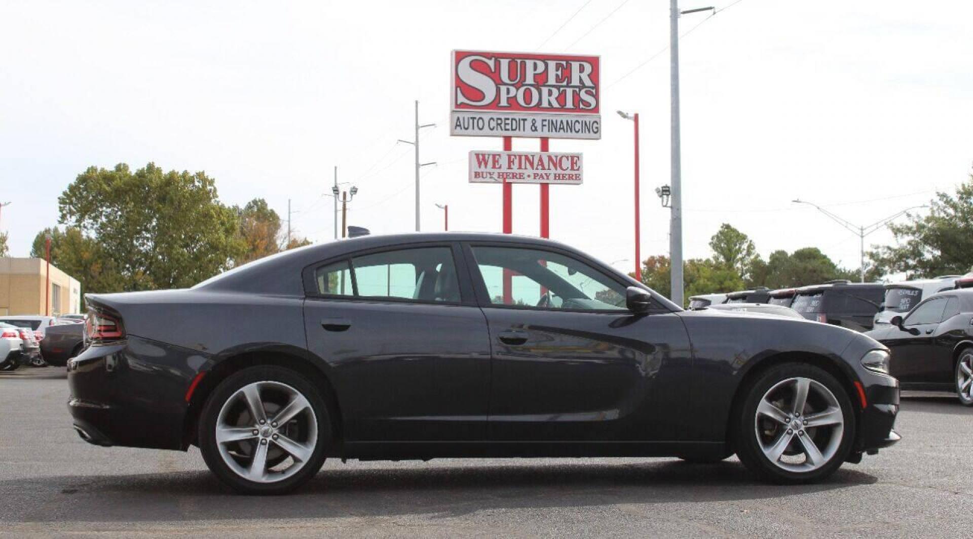 2017 Charcoal Dodge Charger SXT (2C3CDXHG4HH) with an 3.6L V6 DOHC 24V engine, 8A transmission, located at 4301 NW 39th , Oklahoma City, OK, 73112, (405) 949-5600, 35.512135, -97.598671 - NO DRIVERS LICENCE NO-FULL COVERAGE INSURANCE-NO CREDIT CHECK. COME ON OVER TO SUPERSPORTS AND TAKE A LOOK AND TEST DRIVE. PLEASE GIVE US A CALL AT (405) 949-5600. NO LICENSIA DE MANEJAR- NO SEGURO DE COBERTURA TOTAL- NO VERIFICACCION DE CREDITO. POR FAVOR VENGAN A SUPERSPORTS, ECHE UN - Photo#4