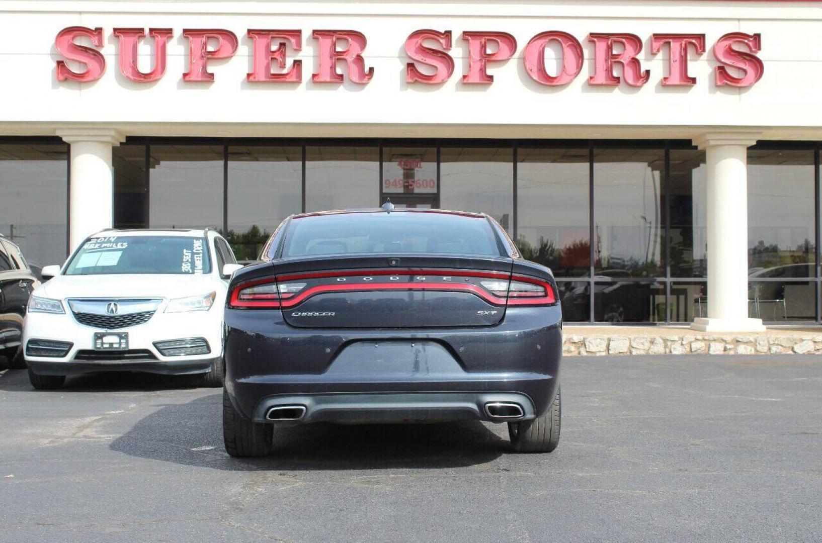 2017 Charcoal Dodge Charger SXT (2C3CDXHG4HH) with an 3.6L V6 DOHC 24V engine, 8A transmission, located at 4301 NW 39th , Oklahoma City, OK, 73112, (405) 949-5600, 35.512135, -97.598671 - NO DRIVERS LICENCE NO-FULL COVERAGE INSURANCE-NO CREDIT CHECK. COME ON OVER TO SUPERSPORTS AND TAKE A LOOK AND TEST DRIVE. PLEASE GIVE US A CALL AT (405) 949-5600. NO LICENSIA DE MANEJAR- NO SEGURO DE COBERTURA TOTAL- NO VERIFICACCION DE CREDITO. POR FAVOR VENGAN A SUPERSPORTS, ECHE UN - Photo#5