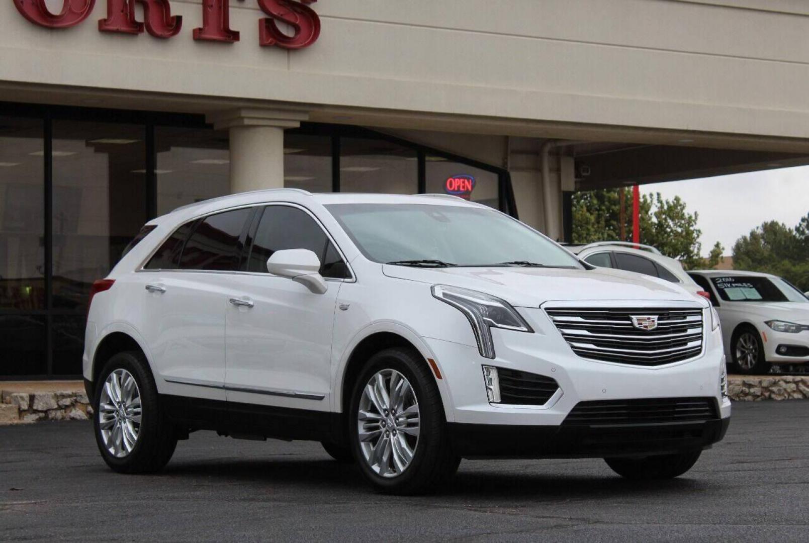2019 White Cadillac XT5 Premium Luxury (1GYKNERS6KZ) with an 3.6L V6 DOHC 24V engine, 8A transmission, located at 4301 NW 39th , Oklahoma City, OK, 73112, (405) 949-5600, 35.512135, -97.598671 - NO DRIVERS LICENCE NO - FULL COVERAGE INSURANCE - NO CREDIT CHECK. COME ON OVER TO SUPERSPORTS AND TAKE A LOOK AND TEST DRIVE. PLEASE GIVE US A CALL AT (405) 949-5600. NO LICENCIA DE MANEJAR - NO SEGURO DE COBERTURA TOTAL - NO VERIFICACION DE CREDITO. POR FAVOR VENGAN A SUPERSPORTS, ECH - Photo#0