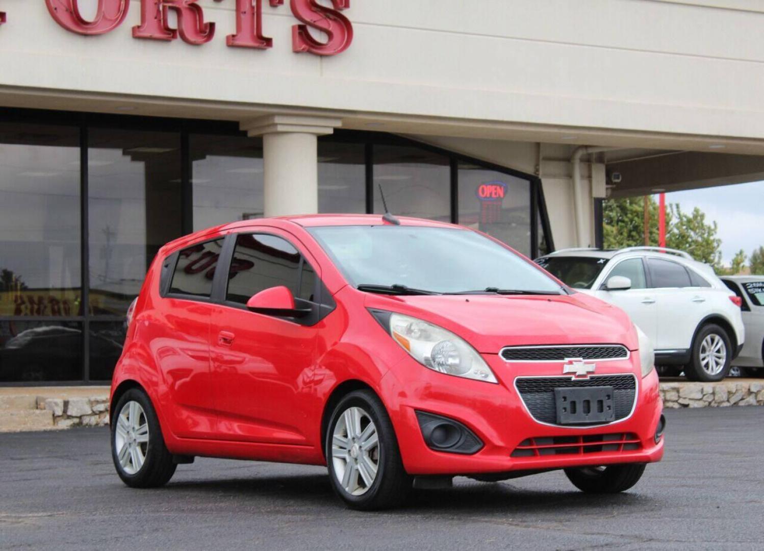 2013 Red Chevrolet Spark LS Manual (KL8CA6S95DC) with an 1.2L L4 16V DOHC engine, 5-Speed Manual transmission, located at 4301 NW 39th , Oklahoma City, OK, 73112, (405) 949-5600, 35.512135, -97.598671 - Photo#2