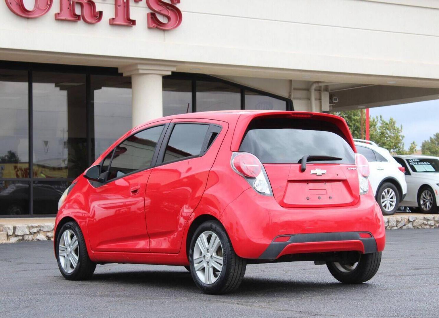 2013 Red Chevrolet Spark LS Manual (KL8CA6S95DC) with an 1.2L L4 16V DOHC engine, 5-Speed Manual transmission, located at 4301 NW 39th , Oklahoma City, OK, 73112, (405) 949-5600, 35.512135, -97.598671 - Photo#6