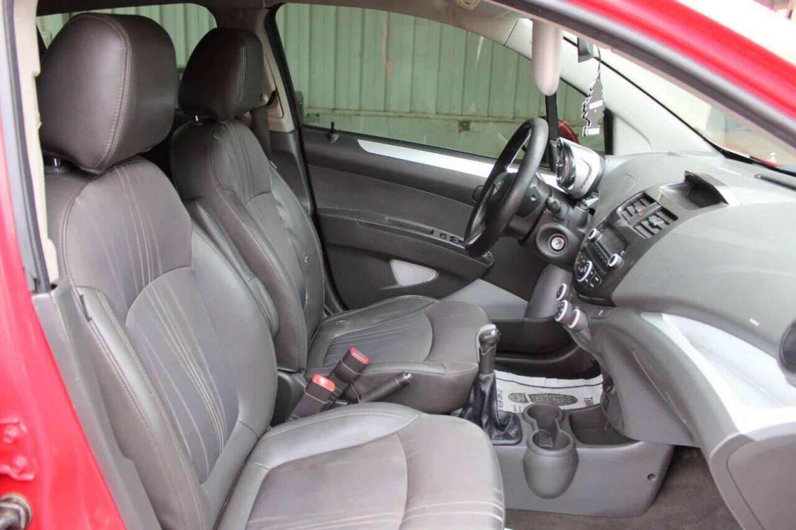 2013 Red Chevrolet Spark LS Manual (KL8CA6S95DC) with an 1.2L L4 16V DOHC engine, 5-Speed Manual transmission, located at 4301 NW 39th , Oklahoma City, OK, 73112, (405) 949-5600, 35.512135, -97.598671 - Photo#10