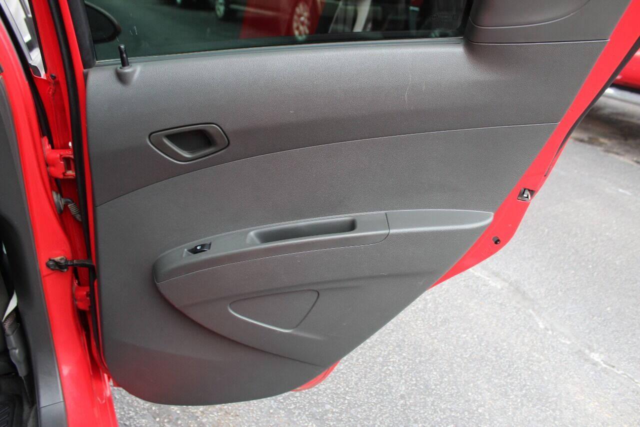 2013 Red Chevrolet Spark LS Manual (KL8CA6S95DC) with an 1.2L L4 16V DOHC engine, 5-Speed Manual transmission, located at 4301 NW 39th , Oklahoma City, OK, 73112, (405) 949-5600, 35.512135, -97.598671 - NO DRIVERS LICENCE -NO FULL COVERAGE INSURANCE - NO CREDIT CHECK. COME ON OVER TO SUPERSPORTS, TAKE A LOOK AND TEST DRIVE. PLEASE GIVE US A CALL AT (405) 949-5600. NO LICENCIA DE CONDUCIR - NO SEGURO DE COBERTURA TOTAL - NO VERIFICACION DE CREDITO. VISITENOS EN SUPERSPORTS, MIRE NUESTRO - Photo#10