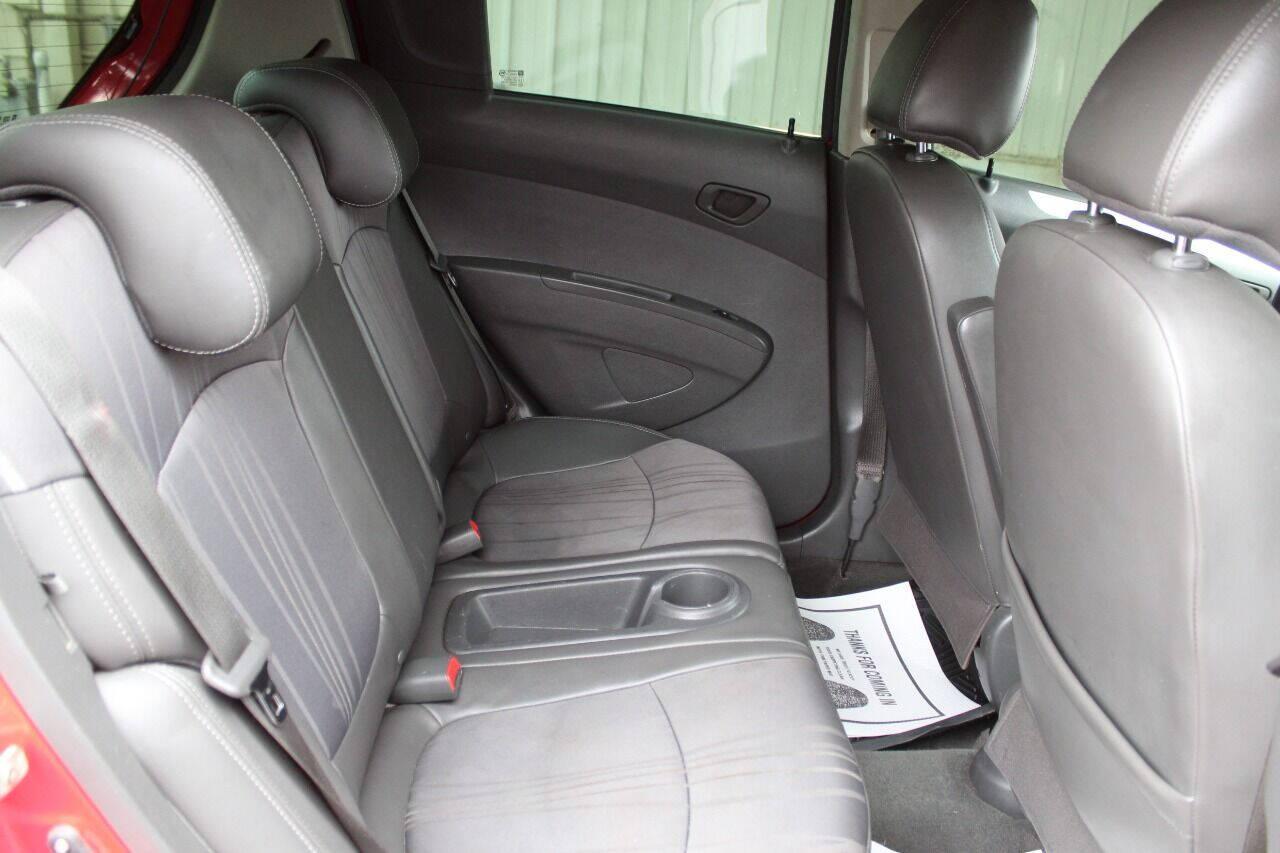 2013 Red Chevrolet Spark LS Manual (KL8CA6S95DC) with an 1.2L L4 16V DOHC engine, 5-Speed Manual transmission, located at 4301 NW 39th , Oklahoma City, OK, 73112, (405) 949-5600, 35.512135, -97.598671 - NO DRIVERS LICENCE -NO FULL COVERAGE INSURANCE - NO CREDIT CHECK. COME ON OVER TO SUPERSPORTS, TAKE A LOOK AND TEST DRIVE. PLEASE GIVE US A CALL AT (405) 949-5600. NO LICENCIA DE CONDUCIR - NO SEGURO DE COBERTURA TOTAL - NO VERIFICACION DE CREDITO. VISITENOS EN SUPERSPORTS, MIRE NUESTRO - Photo#11