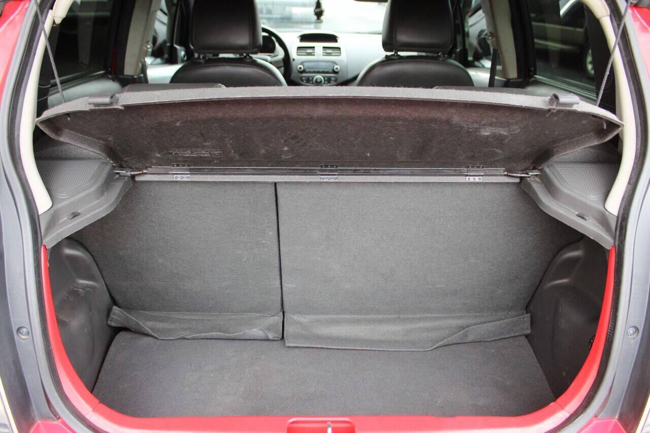 2013 Red Chevrolet Spark LS Manual (KL8CA6S95DC) with an 1.2L L4 16V DOHC engine, 5-Speed Manual transmission, located at 4301 NW 39th , Oklahoma City, OK, 73112, (405) 949-5600, 35.512135, -97.598671 - NO DRIVERS LICENCE -NO FULL COVERAGE INSURANCE - NO CREDIT CHECK. COME ON OVER TO SUPERSPORTS, TAKE A LOOK AND TEST DRIVE. PLEASE GIVE US A CALL AT (405) 949-5600. NO LICENCIA DE CONDUCIR - NO SEGURO DE COBERTURA TOTAL - NO VERIFICACION DE CREDITO. VISITENOS EN SUPERSPORTS, MIRE NUESTRO - Photo#12