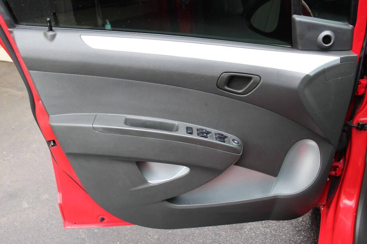 2013 Red Chevrolet Spark LS Manual (KL8CA6S95DC) with an 1.2L L4 16V DOHC engine, 5-Speed Manual transmission, located at 4301 NW 39th , Oklahoma City, OK, 73112, (405) 949-5600, 35.512135, -97.598671 - NO DRIVERS LICENCE -NO FULL COVERAGE INSURANCE - NO CREDIT CHECK. COME ON OVER TO SUPERSPORTS, TAKE A LOOK AND TEST DRIVE. PLEASE GIVE US A CALL AT (405) 949-5600. NO LICENCIA DE CONDUCIR - NO SEGURO DE COBERTURA TOTAL - NO VERIFICACION DE CREDITO. VISITENOS EN SUPERSPORTS, MIRE NUESTRO - Photo#15