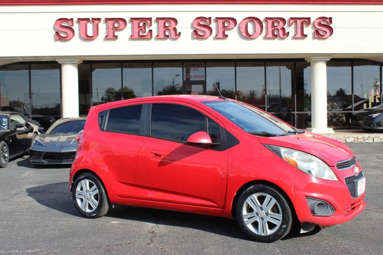 2013 Red Chevrolet Spark LS Manual (KL8CA6S95DC) with an 1.2L L4 16V DOHC engine, 5-Speed Manual transmission, located at 4301 NW 39th , Oklahoma City, OK, 73112, (405) 949-5600, 35.512135, -97.598671 - NO DRIVERS LICENCE -NO FULL COVERAGE INSURANCE - NO CREDIT CHECK. COME ON OVER TO SUPERSPORTS, TAKE A LOOK AND TEST DRIVE. PLEASE GIVE US A CALL AT (405) 949-5600. NO LICENCIA DE CONDUCIR - NO SEGURO DE COBERTURA TOTAL - NO VERIFICACION DE CREDITO. VISITENOS EN SUPERSPORTS, MIRE NUESTRO - Photo#0