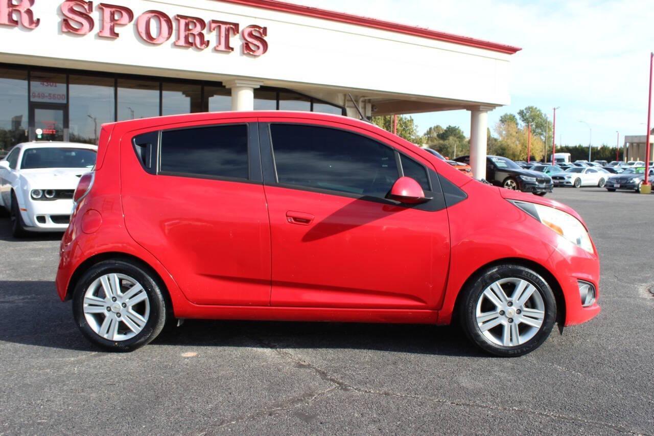 2013 Red Chevrolet Spark LS Manual (KL8CA6S95DC) with an 1.2L L4 16V DOHC engine, 5-Speed Manual transmission, located at 4301 NW 39th , Oklahoma City, OK, 73112, (405) 949-5600, 35.512135, -97.598671 - NO DRIVERS LICENCE -NO FULL COVERAGE INSURANCE - NO CREDIT CHECK. COME ON OVER TO SUPERSPORTS, TAKE A LOOK AND TEST DRIVE. PLEASE GIVE US A CALL AT (405) 949-5600. NO LICENCIA DE CONDUCIR - NO SEGURO DE COBERTURA TOTAL - NO VERIFICACION DE CREDITO. VISITENOS EN SUPERSPORTS, MIRE NUESTRO - Photo#2