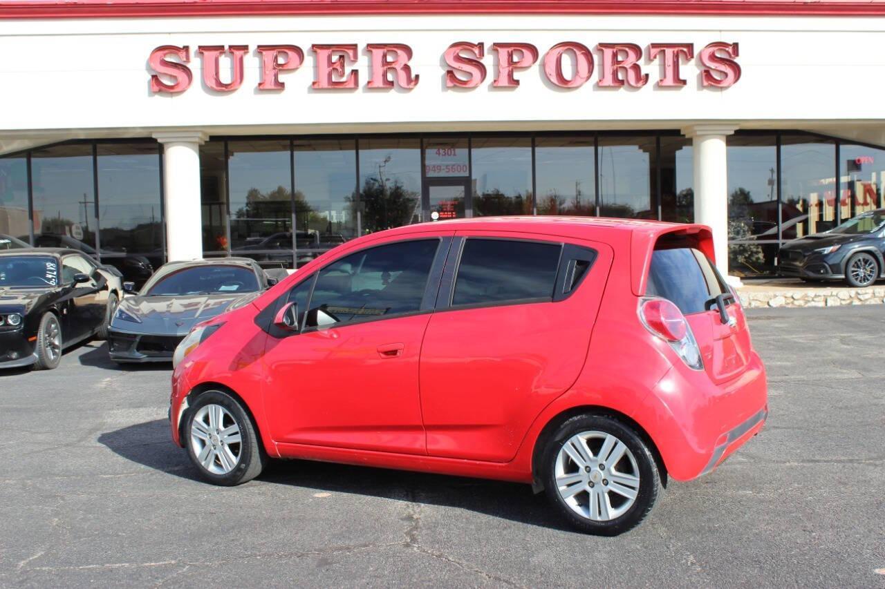 2013 Red Chevrolet Spark LS Manual (KL8CA6S95DC) with an 1.2L L4 16V DOHC engine, 5-Speed Manual transmission, located at 4301 NW 39th , Oklahoma City, OK, 73112, (405) 949-5600, 35.512135, -97.598671 - NO DRIVERS LICENCE -NO FULL COVERAGE INSURANCE - NO CREDIT CHECK. COME ON OVER TO SUPERSPORTS, TAKE A LOOK AND TEST DRIVE. PLEASE GIVE US A CALL AT (405) 949-5600. NO LICENCIA DE CONDUCIR - NO SEGURO DE COBERTURA TOTAL - NO VERIFICACION DE CREDITO. VISITENOS EN SUPERSPORTS, MIRE NUESTRO - Photo#4
