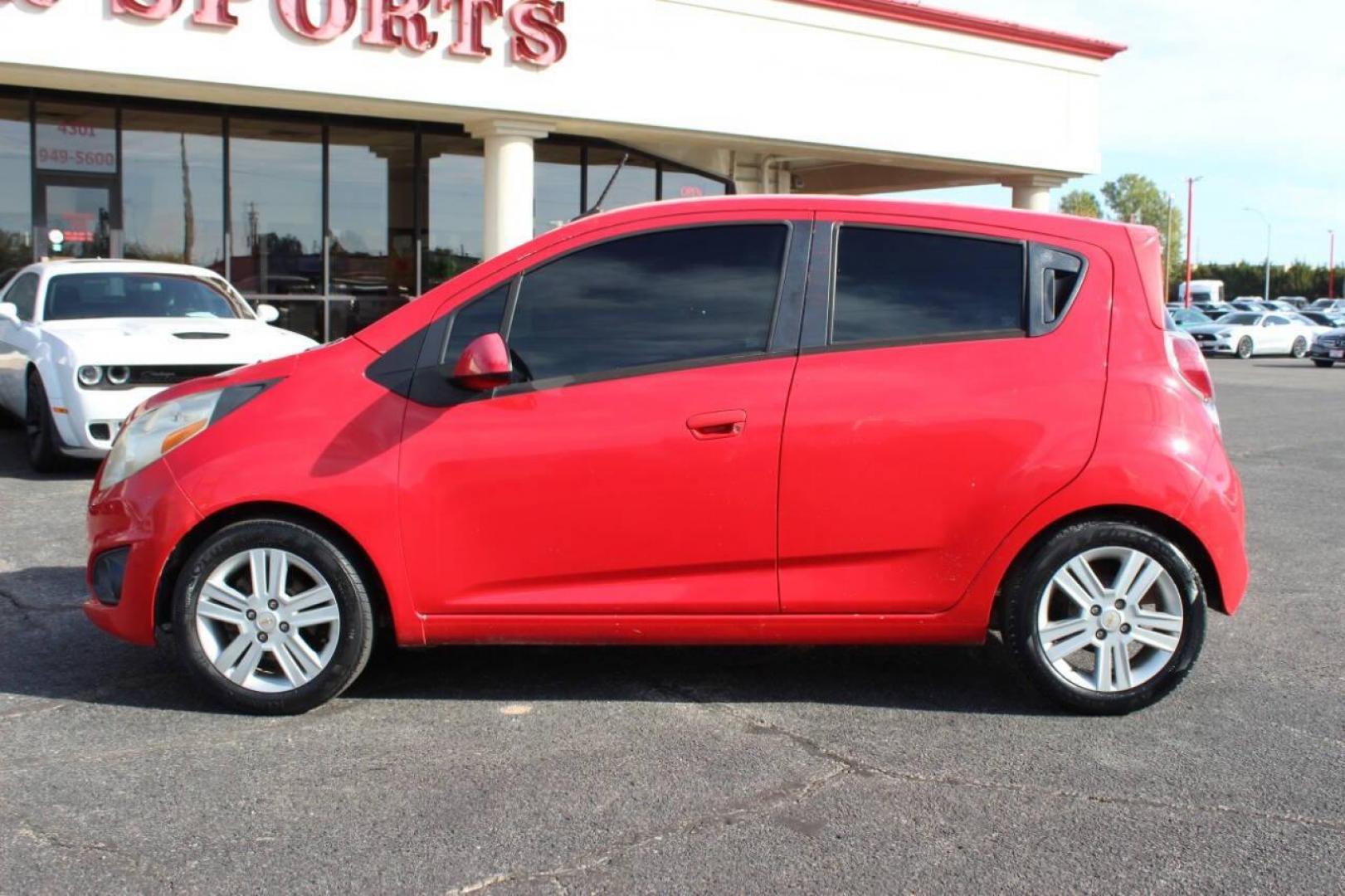 2013 Red Chevrolet Spark LS Manual (KL8CA6S95DC) with an 1.2L L4 16V DOHC engine, 5-Speed Manual transmission, located at 4301 NW 39th , Oklahoma City, OK, 73112, (405) 949-5600, 35.512135, -97.598671 - NO DRIVERS LICENCE -NO FULL COVERAGE INSURANCE - NO CREDIT CHECK. COME ON OVER TO SUPERSPORTS, TAKE A LOOK AND TEST DRIVE. PLEASE GIVE US A CALL AT (405) 949-5600. NO LICENCIA DE CONDUCIR - NO SEGURO DE COBERTURA TOTAL - NO VERIFICACION DE CREDITO. VISITENOS EN SUPERSPORTS, MIRE NUESTRO - Photo#5