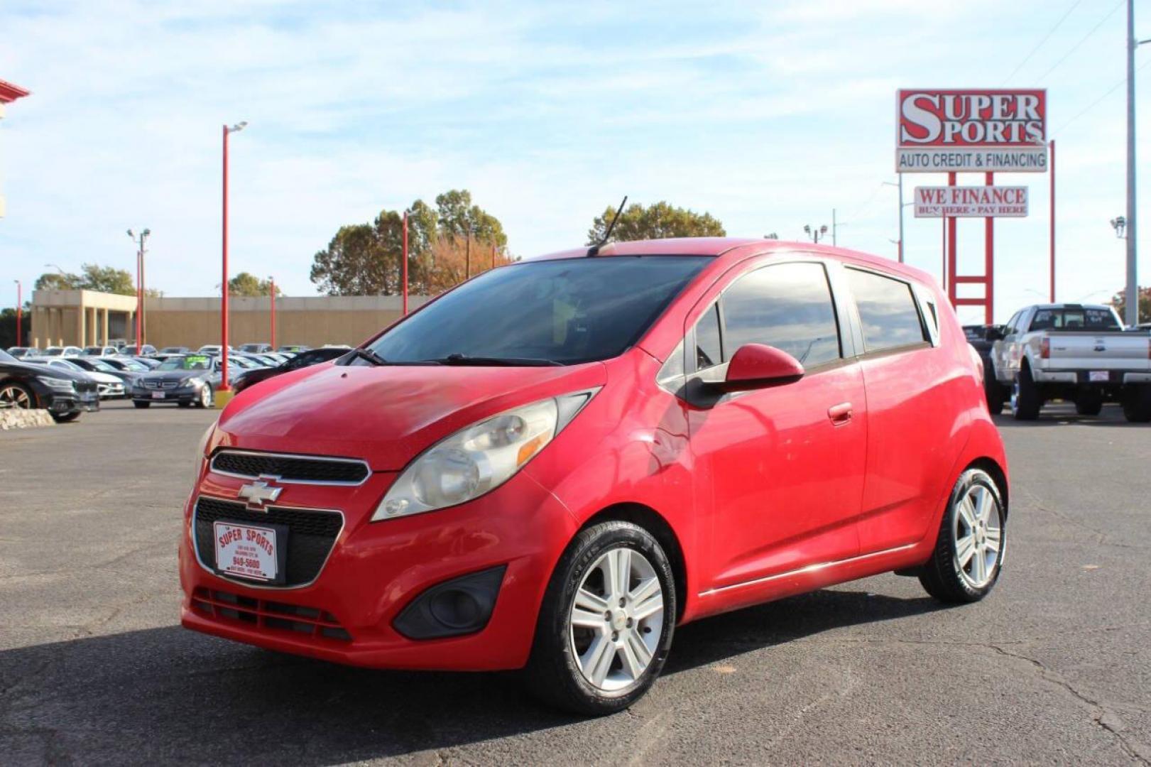 2013 Red Chevrolet Spark LS Manual (KL8CA6S95DC) with an 1.2L L4 16V DOHC engine, 5-Speed Manual transmission, located at 4301 NW 39th , Oklahoma City, OK, 73112, (405) 949-5600, 35.512135, -97.598671 - NO DRIVERS LICENCE -NO FULL COVERAGE INSURANCE - NO CREDIT CHECK. COME ON OVER TO SUPERSPORTS, TAKE A LOOK AND TEST DRIVE. PLEASE GIVE US A CALL AT (405) 949-5600. NO LICENCIA DE CONDUCIR - NO SEGURO DE COBERTURA TOTAL - NO VERIFICACION DE CREDITO. VISITENOS EN SUPERSPORTS, MIRE NUESTRO - Photo#6