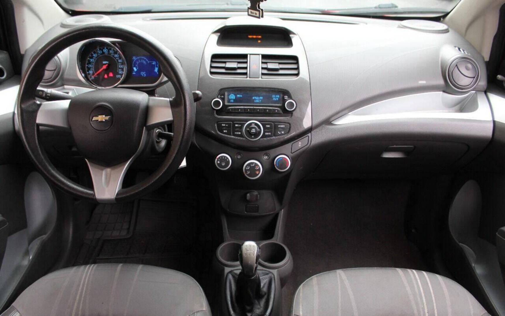 2013 Red Chevrolet Spark LS Manual (KL8CA6S95DC) with an 1.2L L4 16V DOHC engine, 5-Speed Manual transmission, located at 4301 NW 39th , Oklahoma City, OK, 73112, (405) 949-5600, 35.512135, -97.598671 - Photo#17