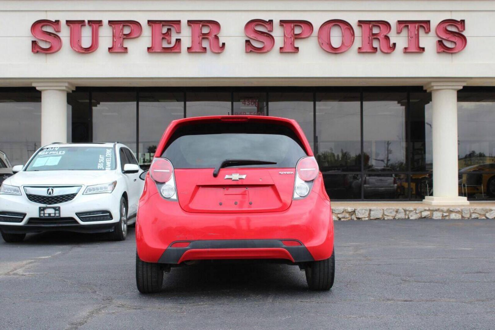 2013 Red Chevrolet Spark LS Manual (KL8CA6S95DC) with an 1.2L L4 16V DOHC engine, 5-Speed Manual transmission, located at 4301 NW 39th , Oklahoma City, OK, 73112, (405) 949-5600, 35.512135, -97.598671 - Photo#5