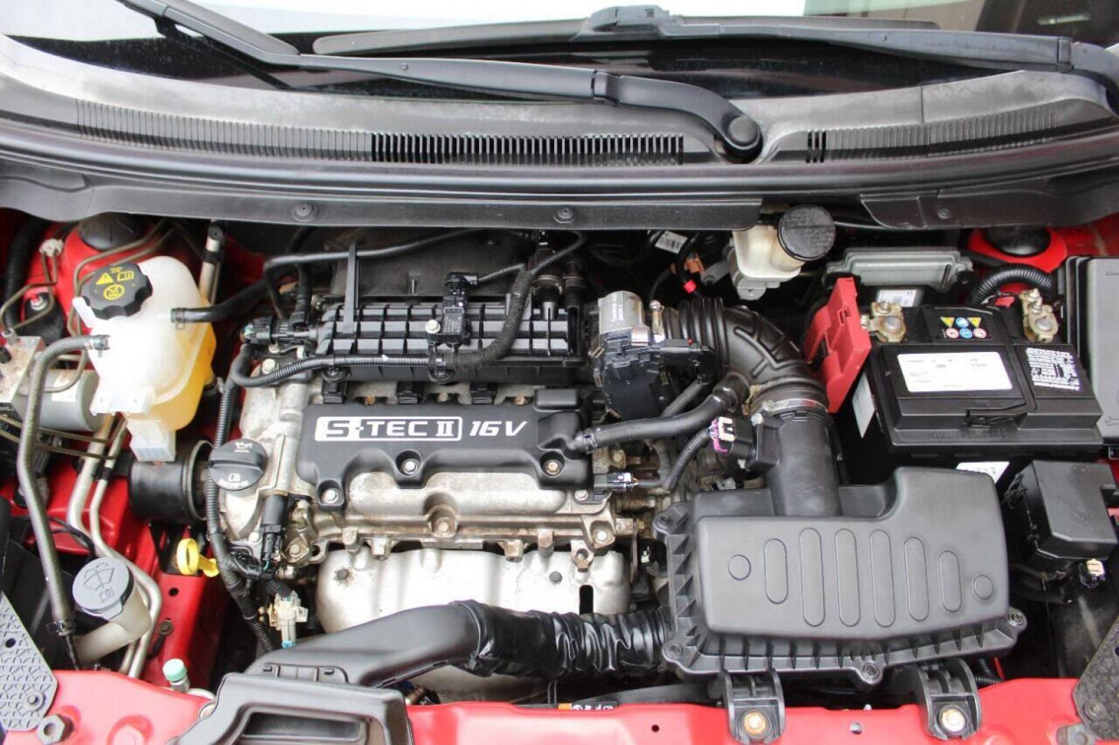 2013 Red Chevrolet Spark LS Manual (KL8CA6S95DC) with an 1.2L L4 16V DOHC engine, 5-Speed Manual transmission, located at 4301 NW 39th , Oklahoma City, OK, 73112, (405) 949-5600, 35.512135, -97.598671 - Photo#8