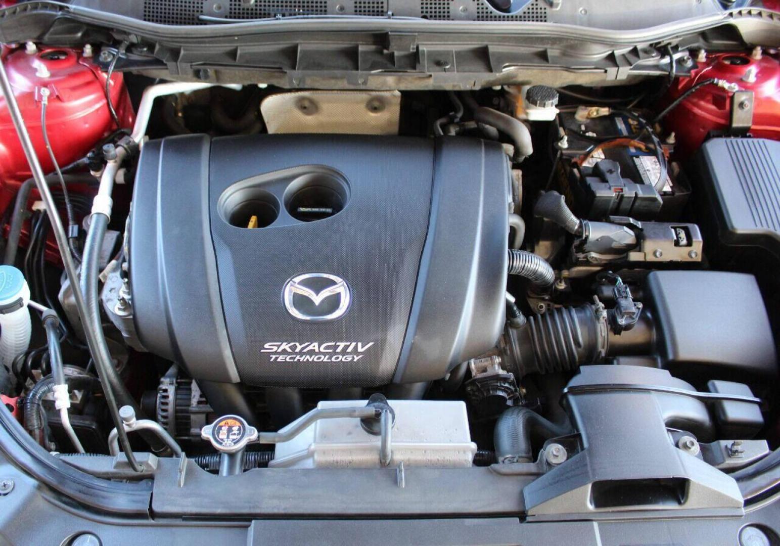 2016 Burgundy Mazda CX-5 Grand Touring AWD (JM3KE4DY9G0) with an 2.5L L4 DOHC 16V engine, 6-Speed Automatic transmission, located at 4301 NW 39th , Oklahoma City, OK, 73112, (405) 949-5600, 35.512135, -97.598671 - NO DRIVERS LICENSE - NO FULL COVERAGE INSURANCE - NO CREDIT CHECK. COME ON OVER TO SUPERSPORTS AND TAKE A LOOK AND TEST DRIVE. PLEASE GIVE US A CALL AT (405) 949-5600. NO LICENCIA DE MANEJAR - NO SEGURO DE COBERTURA TOTAL - NO VERIFICACION DE CREDITO. POR FAVOR VENGAN A SUPERSPORTS, ECH - Photo#7