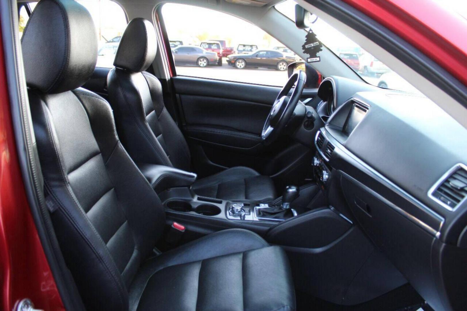 2016 Burgundy Mazda CX-5 Grand Touring AWD (JM3KE4DY9G0) with an 2.5L L4 DOHC 16V engine, 6-Speed Automatic transmission, located at 4301 NW 39th , Oklahoma City, OK, 73112, (405) 949-5600, 35.512135, -97.598671 - NO DRIVERS LICENSE - NO FULL COVERAGE INSURANCE - NO CREDIT CHECK. COME ON OVER TO SUPERSPORTS AND TAKE A LOOK AND TEST DRIVE. PLEASE GIVE US A CALL AT (405) 949-5600. NO LICENCIA DE MANEJAR - NO SEGURO DE COBERTURA TOTAL - NO VERIFICACION DE CREDITO. POR FAVOR VENGAN A SUPERSPORTS, ECH - Photo#9