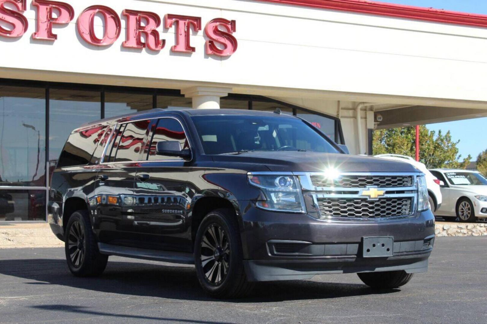 2015 Black Chevrolet Suburban LT 1500 2WD (1GNSCJKC8FR) with an 5.3L V8 5.3L V8 engine, Automatic 6-Speed transmission, located at 4301 NW 39th , Oklahoma City, OK, 73112, (405) 949-5600, 35.512135, -97.598671 - NO DRIVERS LICENCE - NO FULL COVERAGE INSURANCE - NO CREDIT CHECK. COME ON OVER TO SUPERSPORTS AND TAKE A LOOK AND TEST DRIVE. PLEASE GIVE US A CALL AT (405) 949-5600. NO LICENCIA DE MANEJAR - NO SEGURO DE COBERTURA TOTAL - NO VERIFICACION DE CREDITO. POR FAVOR VENGAN A SUPERSPORTS, E- Photo#0