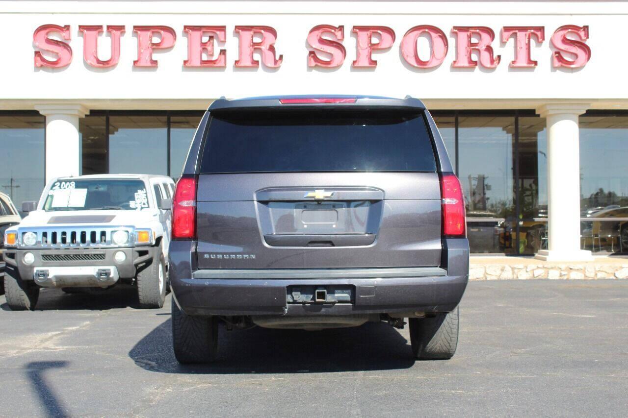 2015 Black Chevrolet Suburban LT 1500 2WD (1GNSCJKC8FR) with an 5.3L V8 5.3L V8 engine, Automatic 6-Speed transmission, located at 4301 NW 39th , Oklahoma City, OK, 73112, (405) 949-5600, 35.512135, -97.598671 - NO DRIVERS LICENCE - NO FULL COVERAGE INSURANCE - NO CREDIT CHECK. COME ON OVER TO SUPERSPORTS AND TAKE A LOOK AND TEST DRIVE. PLEASE GIVE US A CALL AT (405) 949-5600. NO LICENCIA DE MANEJAR - NO SEGURO DE COBERTURA TOTAL - NO VERIFICACION DE CREDITO. POR FAVOR VENGAN A SUPERSPORTS, E - Photo#4