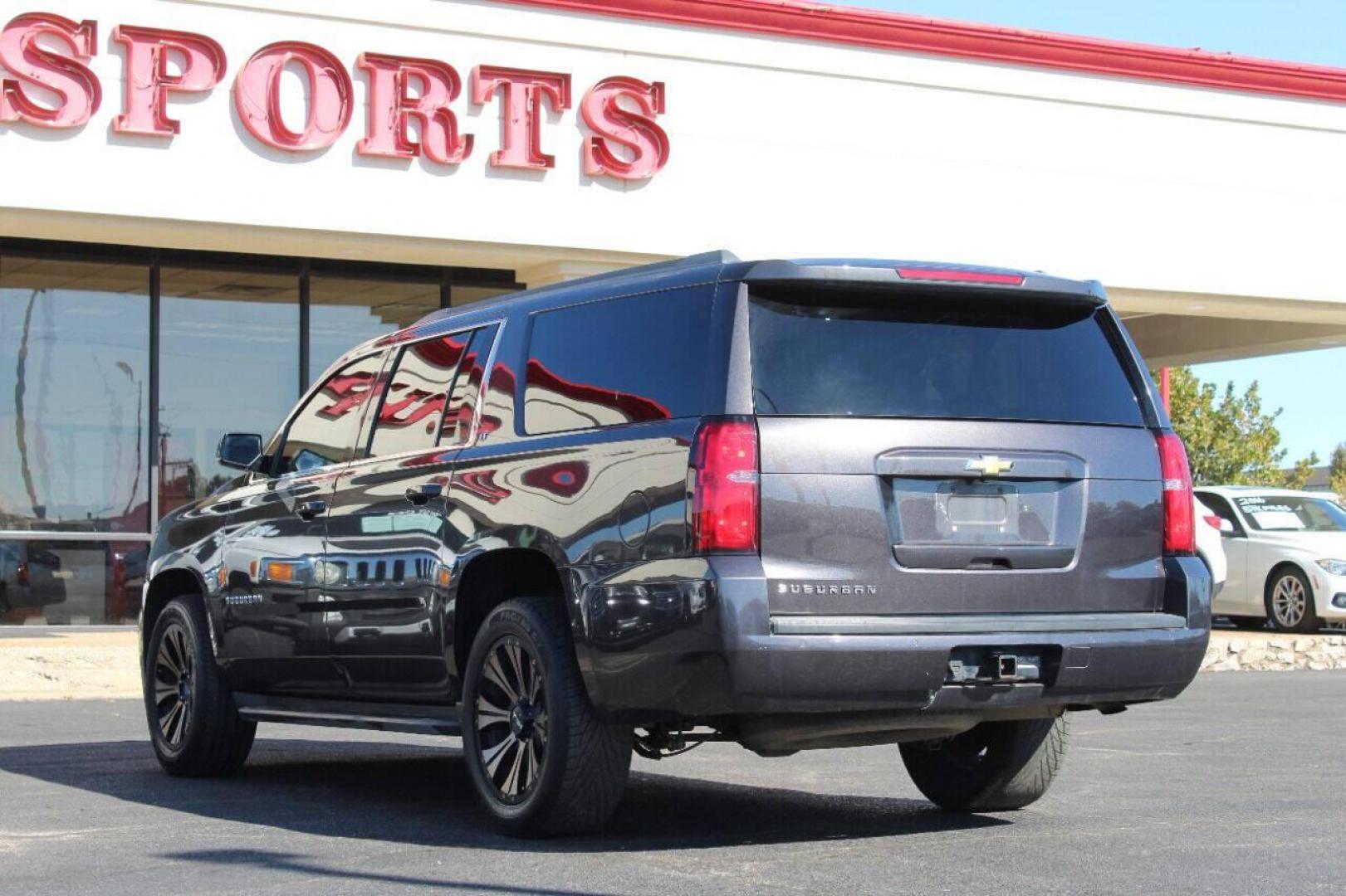 2015 Black Chevrolet Suburban LT 1500 2WD (1GNSCJKC8FR) with an 5.3L V8 5.3L V8 engine, Automatic 6-Speed transmission, located at 4301 NW 39th , Oklahoma City, OK, 73112, (405) 949-5600, 35.512135, -97.598671 - NO DRIVERS LICENCE - NO FULL COVERAGE INSURANCE - NO CREDIT CHECK. COME ON OVER TO SUPERSPORTS AND TAKE A LOOK AND TEST DRIVE. PLEASE GIVE US A CALL AT (405) 949-5600. NO LICENCIA DE MANEJAR - NO SEGURO DE COBERTURA TOTAL - NO VERIFICACION DE CREDITO. POR FAVOR VENGAN A SUPERSPORTS, E- Photo#5