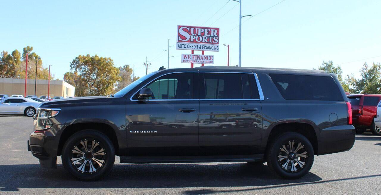 2015 Black Chevrolet Suburban LT 1500 2WD (1GNSCJKC8FR) with an 5.3L V8 5.3L V8 engine, Automatic 6-Speed transmission, located at 4301 NW 39th , Oklahoma City, OK, 73112, (405) 949-5600, 35.512135, -97.598671 - NO DRIVERS LICENCE - NO FULL COVERAGE INSURANCE - NO CREDIT CHECK. COME ON OVER TO SUPERSPORTS AND TAKE A LOOK AND TEST DRIVE. PLEASE GIVE US A CALL AT (405) 949-5600. NO LICENCIA DE MANEJAR - NO SEGURO DE COBERTURA TOTAL - NO VERIFICACION DE CREDITO. POR FAVOR VENGAN A SUPERSPORTS, E - Photo#6