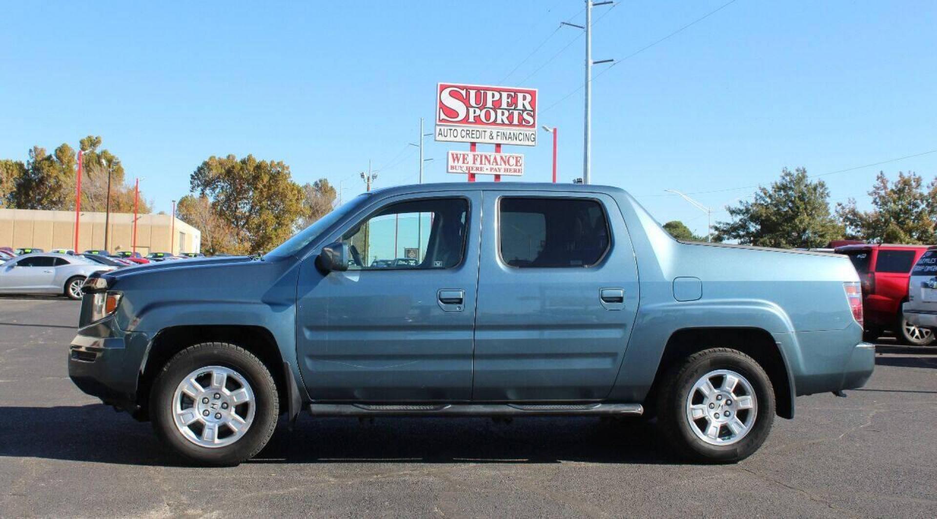 2008 Blue Honda Ridgeline RTS (2HJYK16428H) with an 3.5L V6 SOHC 24V engine, 5-Speed Automatic Overdrive transmission, located at 4301 NW 39th , Oklahoma City, OK, 73112, (405) 949-5600, 35.512135, -97.598671 - NO DRIVERS LICENSE - NO FULL COVERAGE INSURANCE - NO CREDIT CHECK. COME ON OVER TO SUPERSPORTS AND TAKE A LOOK AND TEST DRIVE PLEASE GIVE US A CALL AT (405) 949-5600. NO LICENCIA DE MANEJAR - NO SEGURO DE COBERTURA TOTAL - NO VERIFICACION DE CREDITO. POR FAVOR VENGAN A SUPERSPORTS, - Photo#6