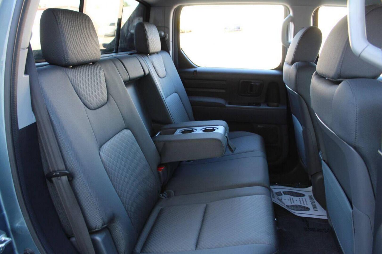 2008 Blue Honda Ridgeline RTS (2HJYK16428H) with an 3.5L V6 SOHC 24V engine, 5-Speed Automatic Overdrive transmission, located at 4301 NW 39th , Oklahoma City, OK, 73112, (405) 949-5600, 35.512135, -97.598671 - Photo#11