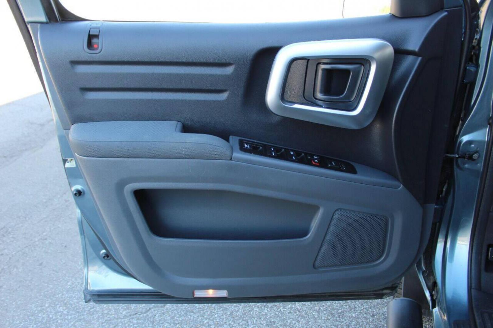 2008 Blue Honda Ridgeline RTS (2HJYK16428H) with an 3.5L V6 SOHC 24V engine, 5-Speed Automatic Overdrive transmission, located at 4301 NW 39th , Oklahoma City, OK, 73112, (405) 949-5600, 35.512135, -97.598671 - Photo#15