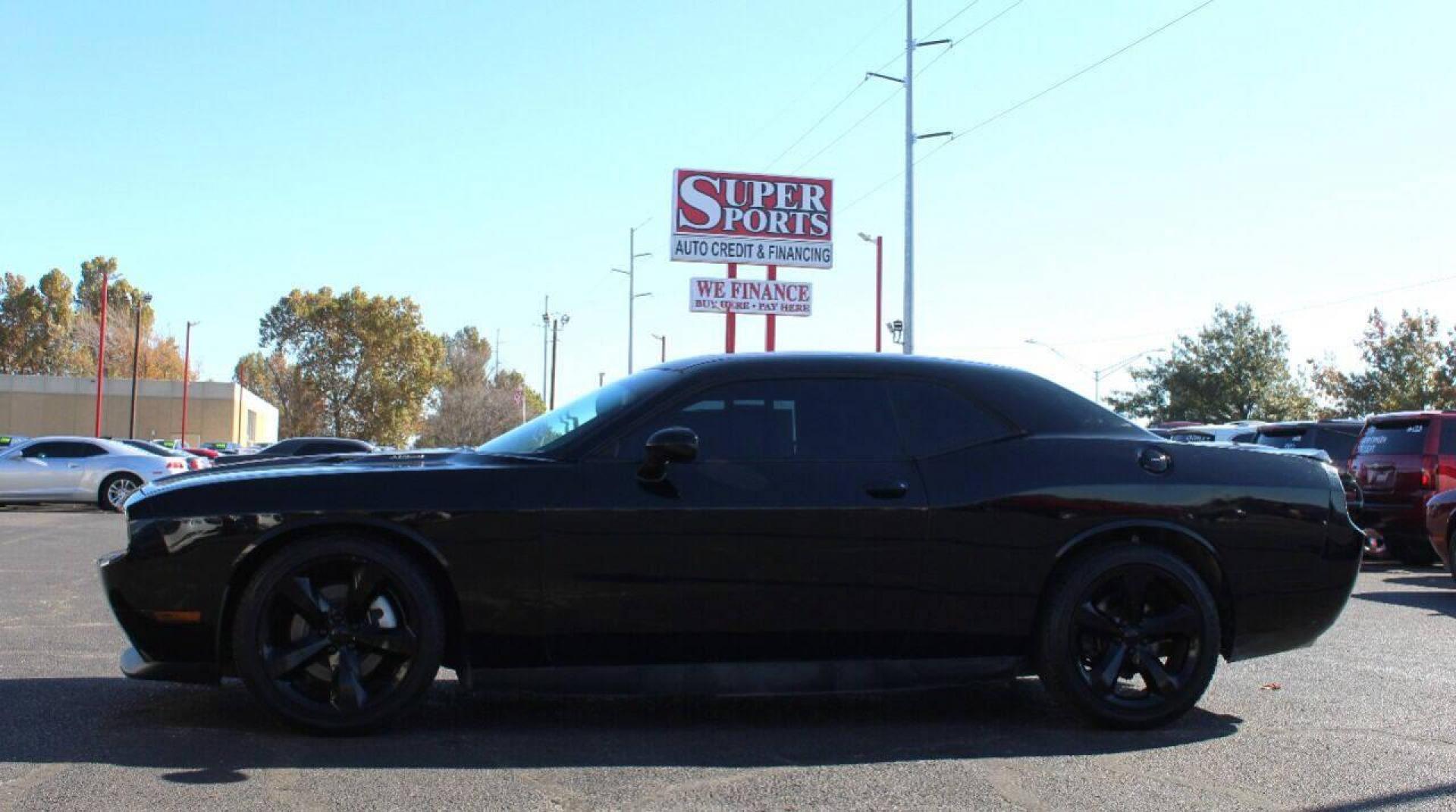 2013 Black Dodge Challenger R/T (2C3CDYBT2DH) with an 5.7L V8 OHV 16V engine, 4-Speed Automatic transmission, located at 4301 NW 39th , Oklahoma City, OK, 73112, (405) 949-5600, 35.512135, -97.598671 - Photo#6