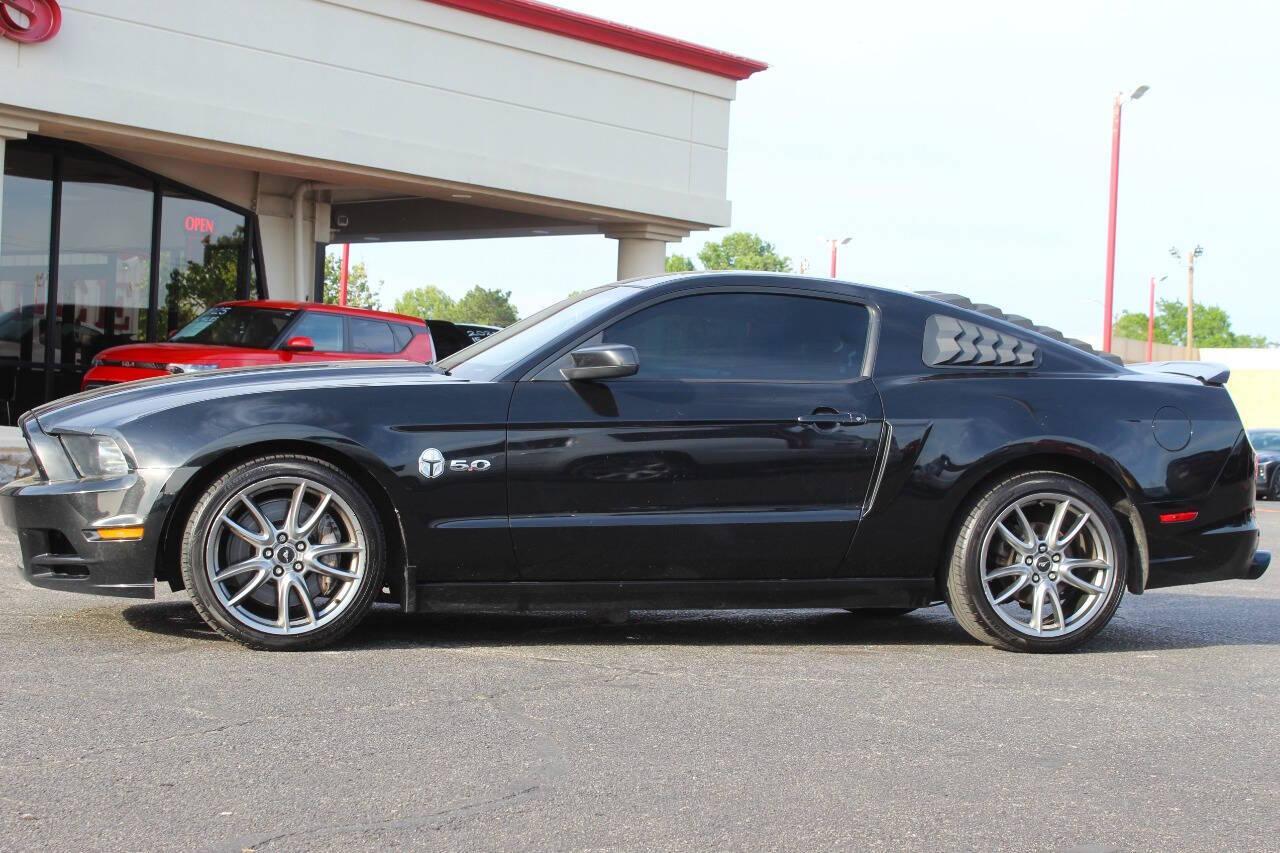 2014 Black Ford Mustang GT Coupe (1ZVBP8CF9E5) with an 5.0L V8 5.0L V8 engine, Automatic 6-Speed transmission, located at 4301 NW 39th , Oklahoma City, OK, 73112, (405) 949-5600, 35.512135, -97.598671 - NO DRIVERS LICENCE -NO FULL COVERAGE INSURANCE - NO CREDIT CHECK. COME ON OVER TO SUPERSPORTS, TAKE A LOOK AND TEST DRIVE. PLEASE GIVE US A CALL AT (405) 949-5600. NO LICENCIA DE CONDUCIR - NO SEGURO DE COBERTURA TOTAL - NO VERIFICACION DE CREDITO. VISITENOS EN SUPERSPORTS, MIRE NUESTRO N - Photo#5