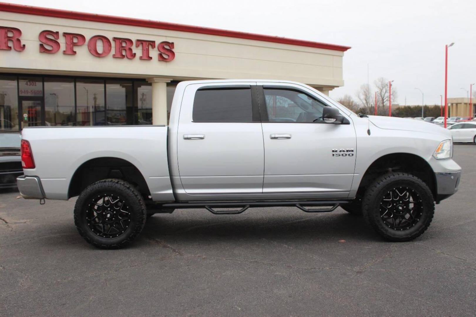 2016 Gray RAM 1500 SLT Crew Cab SWB 4WD (1C6RR7LT6GS) with an 5.7L V8 OHV 16V engine, 6A transmission, located at 4301 NW 39th , Oklahoma City, OK, 73112, (405) 949-5600, 35.512135, -97.598671 - NO DRIVERS LICENCE NO-FULL COVERAGE INSURANCE-NO CREDIT CHECK. COME ON OVER TO SUPERSPORTS AND TAKE A LOOK AND TEST DRIVE. PLEASE GIVE US A CALL AT (405) 949-5600. NO LICENSIA DE MANEJAR- NO SEGURO DE COBERTURA TOTAL- NO VERIFICACCION DE CREDITO. POR FAVOR VENGAN A SUPERSPORTS, ECHE UN VI - Photo#2