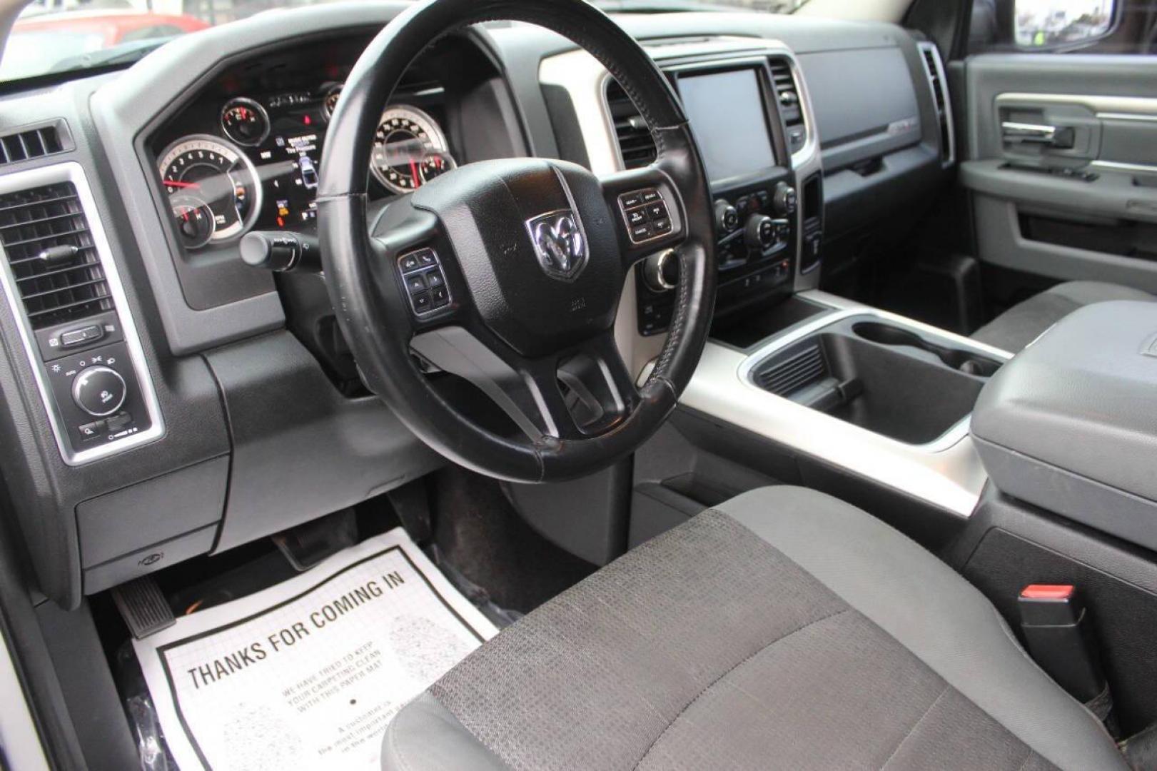 2016 Gray RAM 1500 SLT Crew Cab SWB 4WD (1C6RR7LT6GS) with an 5.7L V8 OHV 16V engine, 6A transmission, located at 4301 NW 39th , Oklahoma City, OK, 73112, (405) 949-5600, 35.512135, -97.598671 - NO DRIVERS LICENCE NO-FULL COVERAGE INSURANCE-NO CREDIT CHECK. COME ON OVER TO SUPERSPORTS AND TAKE A LOOK AND TEST DRIVE. PLEASE GIVE US A CALL AT (405) 949-5600. NO LICENSIA DE MANEJAR- NO SEGURO DE COBERTURA TOTAL- NO VERIFICACCION DE CREDITO. POR FAVOR VENGAN A SUPERSPORTS, ECHE UN VI - Photo#15