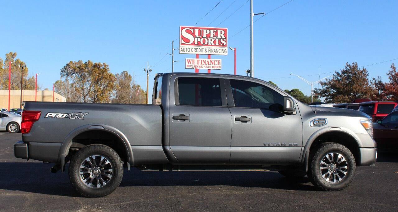 2017 Gray Nissan Titan XD SL 4WD Diesel (1N6BA1F45HN) with an 5.0L V8 Turbocharger 5.0L V8 engine, Automatic 6-Speed transmission, located at 4301 NW 39th , Oklahoma City, OK, 73112, (405) 949-5600, 35.512135, -97.598671 - Hablamos espanol. SPEND SMART --- BUY FROM SUPER SPORTS. ALL PRICES, DOWN PAYMENTS, PAYMENTS, AND FINANCE TERMS ARE NEGOTIABLE AT THE TIME OF APPROVAL. WE WILL WORK WITH YOU TO FIT YOUR BUDGET. WE WILL EVEN LOWER AND ADJUST THE NUMBERS TO HELP MAKE THE VE HICLE MORE AFFORDABLE FOR YOU.- Photo#3