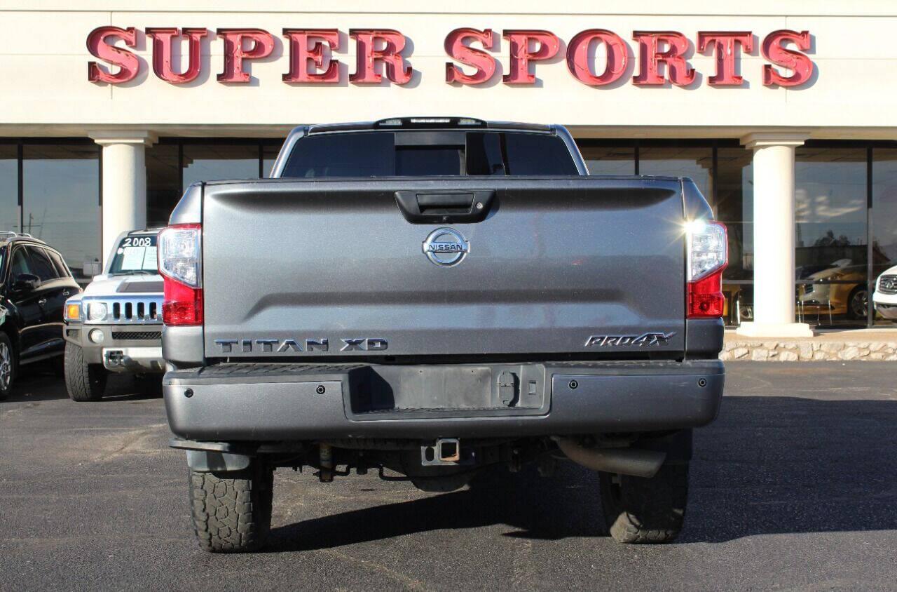 2017 Gray Nissan Titan XD SL 4WD Diesel (1N6BA1F45HN) with an 5.0L V8 Turbocharger 5.0L V8 engine, Automatic 6-Speed transmission, located at 4301 NW 39th , Oklahoma City, OK, 73112, (405) 949-5600, 35.512135, -97.598671 - Hablamos espanol. SPEND SMART --- BUY FROM SUPER SPORTS. ALL PRICES, DOWN PAYMENTS, PAYMENTS, AND FINANCE TERMS ARE NEGOTIABLE AT THE TIME OF APPROVAL. WE WILL WORK WITH YOU TO FIT YOUR BUDGET. WE WILL EVEN LOWER AND ADJUST THE NUMBERS TO HELP MAKE THE VE HICLE MORE AFFORDABLE FOR YOU.- Photo#4