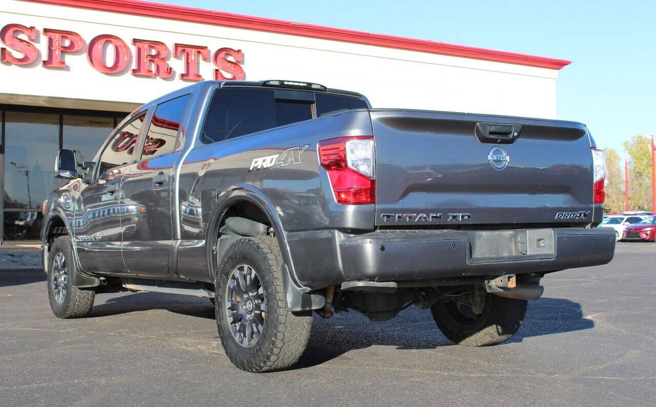 2017 Gray Nissan Titan XD SL 4WD Diesel (1N6BA1F45HN) with an 5.0L V8 Turbocharger 5.0L V8 engine, Automatic 6-Speed transmission, located at 4301 NW 39th , Oklahoma City, OK, 73112, (405) 949-5600, 35.512135, -97.598671 - Hablamos espanol. SPEND SMART --- BUY FROM SUPER SPORTS. ALL PRICES, DOWN PAYMENTS, PAYMENTS, AND FINANCE TERMS ARE NEGOTIABLE AT THE TIME OF APPROVAL. WE WILL WORK WITH YOU TO FIT YOUR BUDGET. WE WILL EVEN LOWER AND ADJUST THE NUMBERS TO HELP MAKE THE VE HICLE MORE AFFORDABLE FOR YOU.- Photo#5