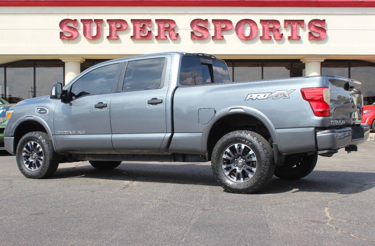 2017 Gray Nissan Titan XD SL 4WD Diesel (1N6BA1F45HN) with an 5.0L V8 Turbocharger 5.0L V8 engine, Automatic 6-Speed transmission, located at 4301 NW 39th , Oklahoma City, OK, 73112, (405) 949-5600, 35.512135, -97.598671 - Hablamos espanol. SPEND SMART --- BUY FROM SUPER SPORTS. ALL PRICES, DOWN PAYMENTS, PAYMENTS, AND FINANCE TERMS ARE NEGOTIABLE AT THE TIME OF APPROVAL. WE WILL WORK WITH YOU TO FIT YOUR BUDGET. WE WILL EVEN LOWER AND ADJUST THE NUMBERS TO HELP MAKE THE VE HICLE MORE AFFORDABLE FOR YOU.- Photo#4