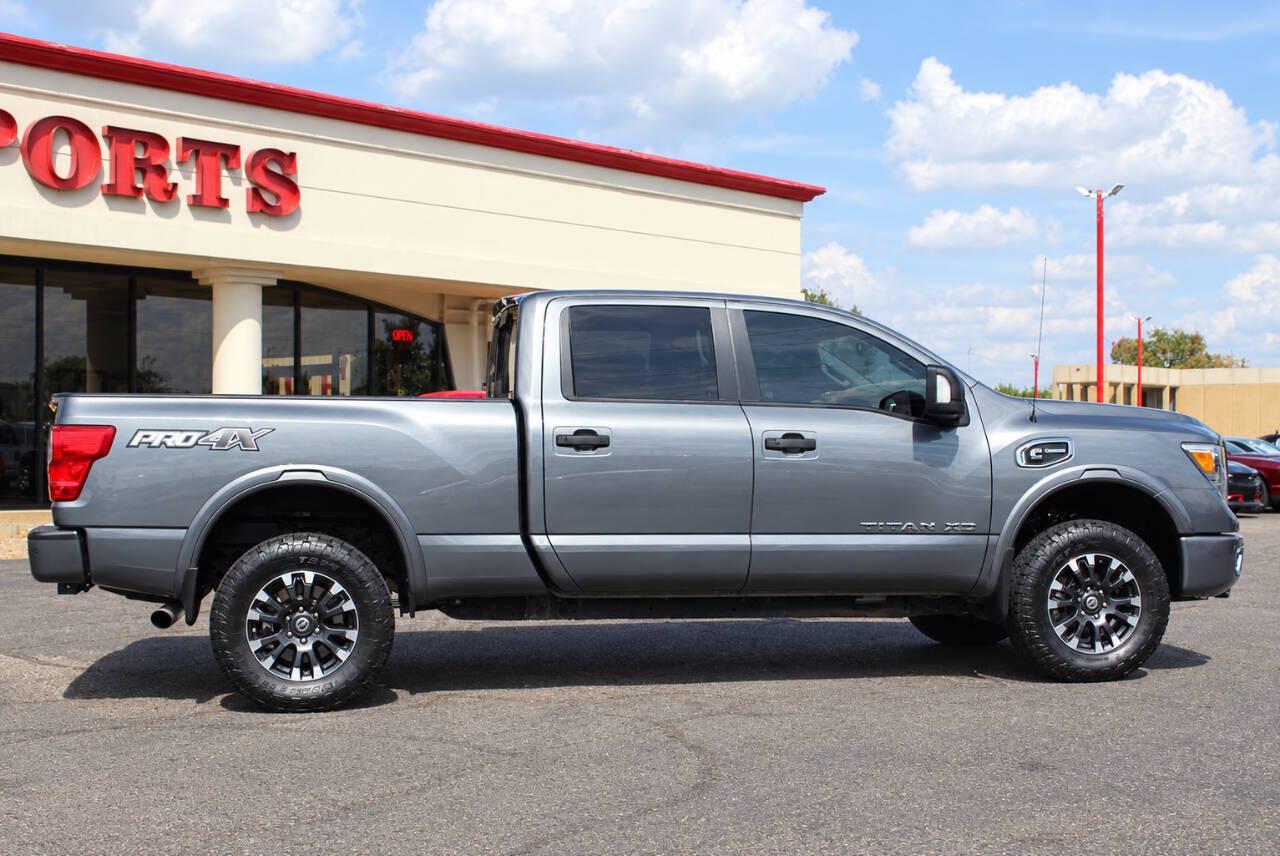 2017 Gray Nissan Titan XD SL 4WD Diesel (1N6BA1F45HN) with an 5.0L V8 Turbocharger 5.0L V8 engine, Automatic 6-Speed transmission, located at 4301 NW 39th , Oklahoma City, OK, 73112, (405) 949-5600, 35.512135, -97.598671 - Hablamos espanol. SPEND SMART --- BUY FROM SUPER SPORTS. ALL PRICES, DOWN PAYMENTS, PAYMENTS, AND FINANCE TERMS ARE NEGOTIABLE AT THE TIME OF APPROVAL. WE WILL WORK WITH YOU TO FIT YOUR BUDGET. WE WILL EVEN LOWER AND ADJUST THE NUMBERS TO HELP MAKE THE VE HICLE MORE AFFORDABLE FOR YOU.- Photo#2
