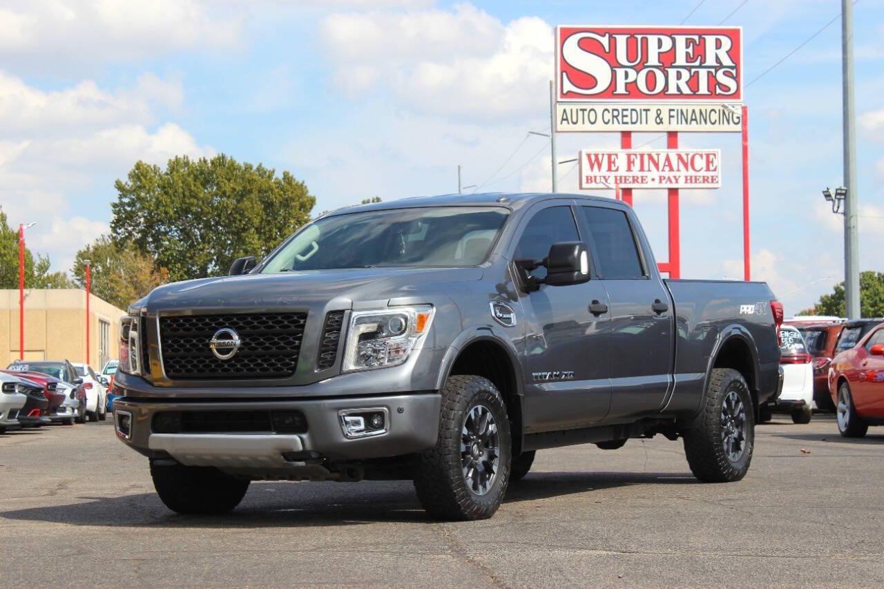 2017 Gray Nissan Titan XD SL 4WD Diesel (1N6BA1F45HN) with an 5.0L V8 Turbocharger 5.0L V8 engine, Automatic 6-Speed transmission, located at 4301 NW 39th , Oklahoma City, OK, 73112, (405) 949-5600, 35.512135, -97.598671 - Hablamos espanol. SPEND SMART --- BUY FROM SUPER SPORTS. ALL PRICES, DOWN PAYMENTS, PAYMENTS, AND FINANCE TERMS ARE NEGOTIABLE AT THE TIME OF APPROVAL. WE WILL WORK WITH YOU TO FIT YOUR BUDGET. WE WILL EVEN LOWER AND ADJUST THE NUMBERS TO HELP MAKE THE VE HICLE MORE AFFORDABLE FOR YOU.- Photo#5