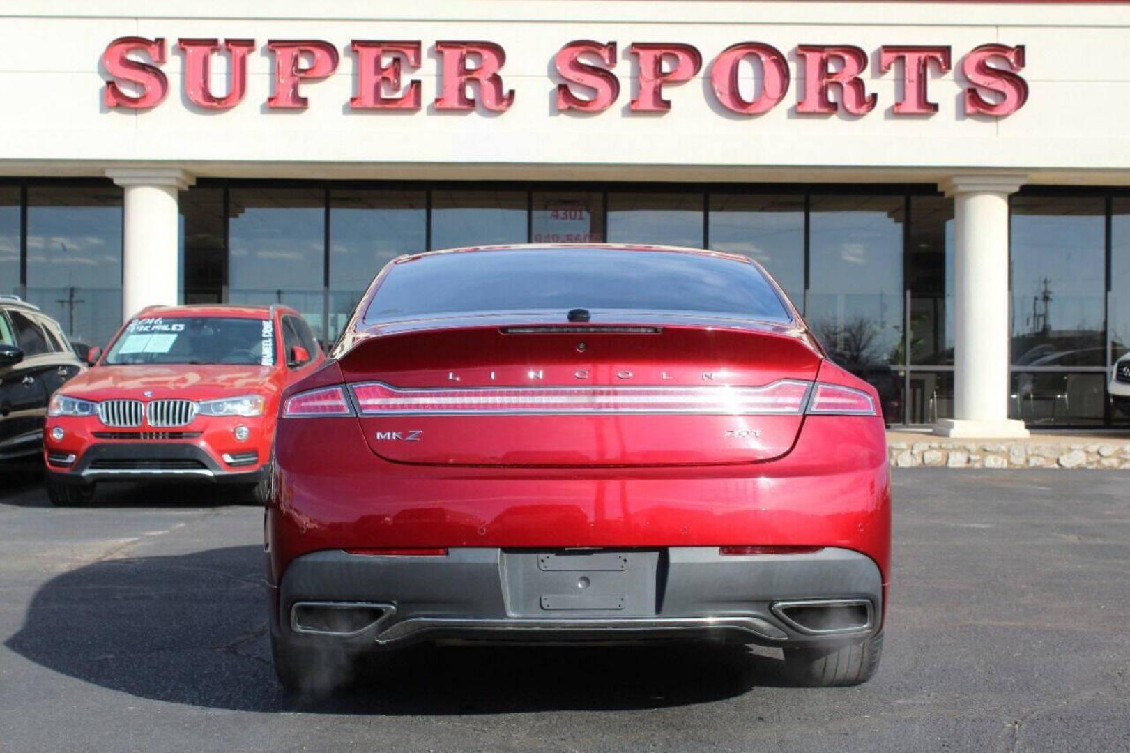 2017 Red Lincoln MKZ Premier FWD (3LN6L5A98HR) with an 2.0L L4 DOHC 16V engine, 6A transmission, located at 4301 NW 39th , Oklahoma City, OK, 73112, (405) 949-5600, 35.512135, -97.598671 - Photo#4