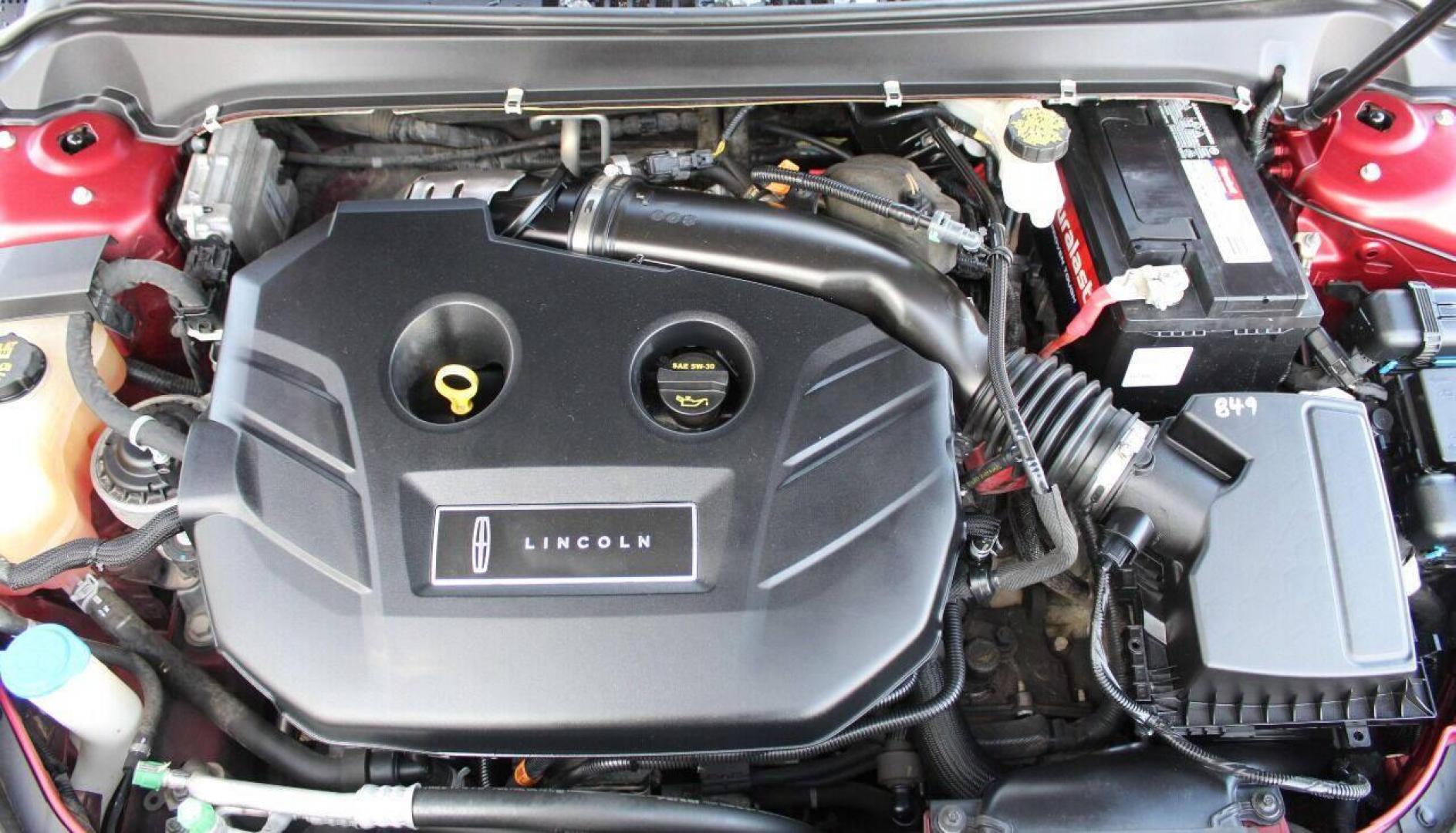 2017 Red Lincoln MKZ Premier FWD (3LN6L5A98HR) with an 2.0L L4 DOHC 16V engine, 6A transmission, located at 4301 NW 39th , Oklahoma City, OK, 73112, (405) 949-5600, 35.512135, -97.598671 - Photo#7