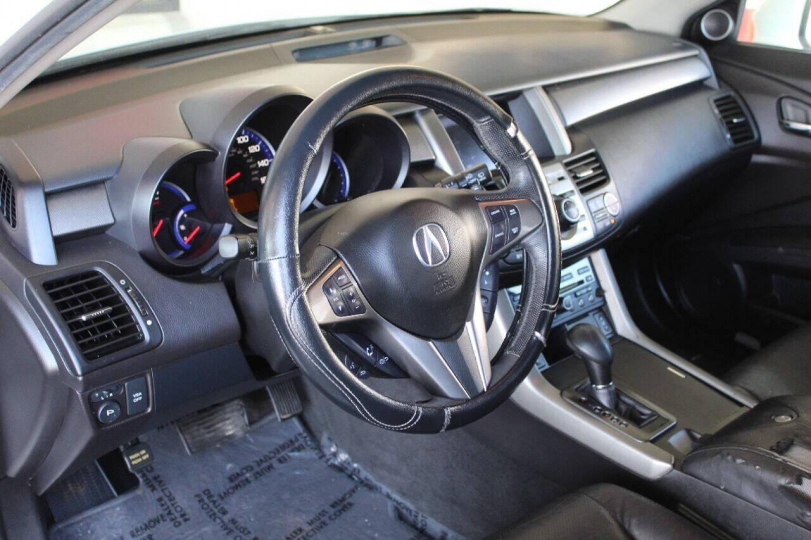 2010 White Acura RDX 5-Spd AT with Technology Package (5J8TB1H5XAA) with an 2.3L L4 DOHC 16V engine, 5-Speed Automatic transmission, located at 4301 NW 39th , Oklahoma City, OK, 73112, (405) 949-5600, 35.512135, -97.598671 - NO DRIVERS LICENSE - NO FULL COVERAGE INSURANCE - NO CREDIT CHECK. COME ON OVER TO SUPERSPORTS AND TAKE A LOOK AND TEST DRIVE. PLEASE GIVE US A CALL AT (405) 949-5600. NO LICENCIA DE MANEJAR - NO SEGURO DE COBERTURA TOTAL - NO VERIFICACION DE CREDITO. POR FAVOR VENGAN A SUPERSPORTS, ECH - Photo#16