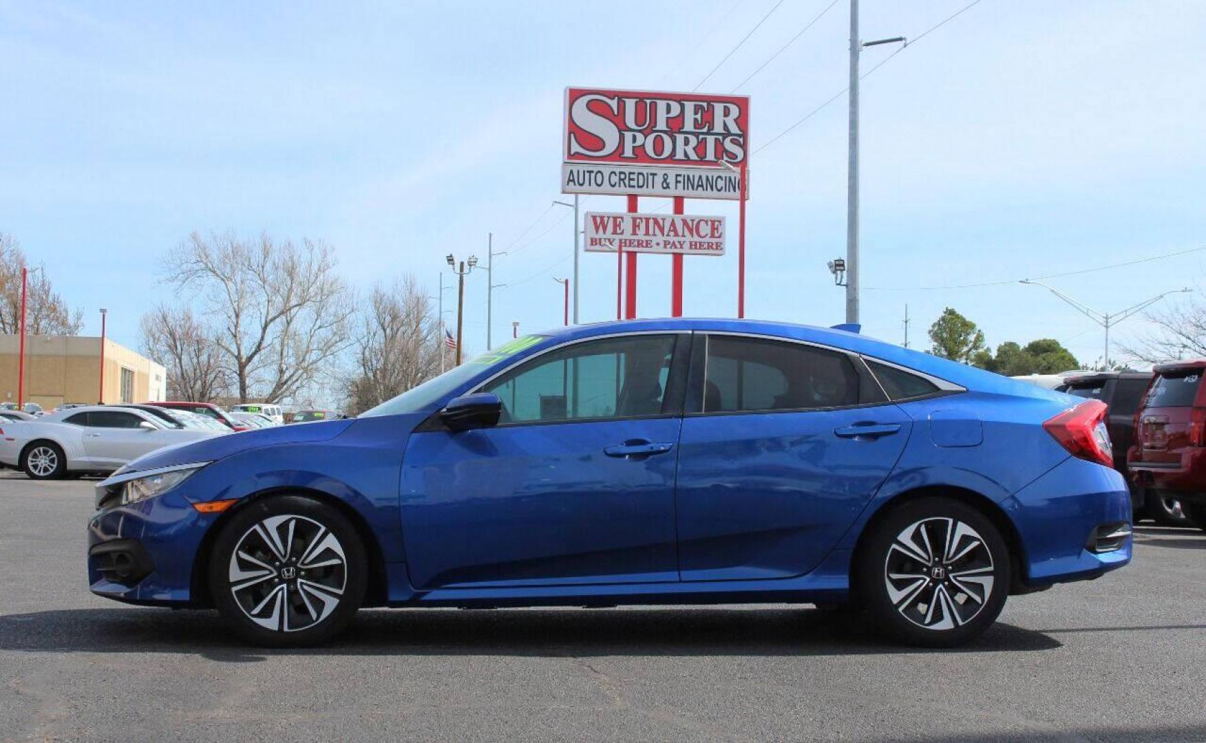 2016 Blue Honda Civic EX-T Sedan CVT (19XFC1F31GE) with an 1.5L L4 DOHC 16V TURBO engine, CVT transmission, located at 4301 NW 39th , Oklahoma City, OK, 73112, (405) 949-5600, 35.512135, -97.598671 - NO DRIVERS LICENSE - NO FULL COVERAGE INSURANCE - NO CREDIT CHECK. COME ON OVER TO SUPERSPORTS AND TAKE A LOOK AND TEST DRIVE PLEASE GIVE US A CALL AT (405) 949-5600. NO LICENCIA DE MANEJAR - NO SEGURO DE COBERTURA TOTAL- NO VERIFICACCION DE CREDITO. POR FAVOR VENGAN A SUPERSPORTS, ECHE - Photo#6