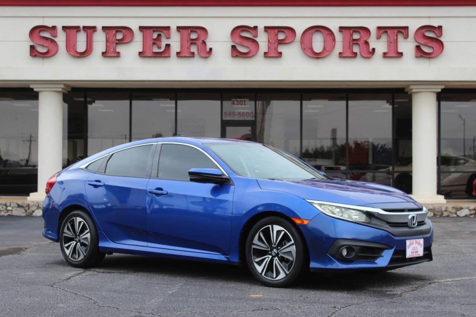 2016 Blue Honda Civic EX-T Sedan CVT (19XFC1F31GE) with an 1.5L L4 DOHC 16V TURBO engine, CVT transmission, located at 4301 NW 39th , Oklahoma City, OK, 73112, (405) 949-5600, 35.512135, -97.598671 - NO DRIVERS LICENCE NO-FULL COVERAGE INSURANCE-NO CREDIT CHECK. COME ON OVER TO SUPERSPORTS AND TAKE A LOOK AND TEST DRIVE. PLEASE GIVE US A CALL AT (405) 949-5600. NO LICENSIA DE MANEJAR- NO SEGURO DE COBERTURA TOTAL- NO VERIFICACCION DE CREDITO. POR FAVOR VENGAN A SUPERSPORTS, ECHE UN - Photo#2