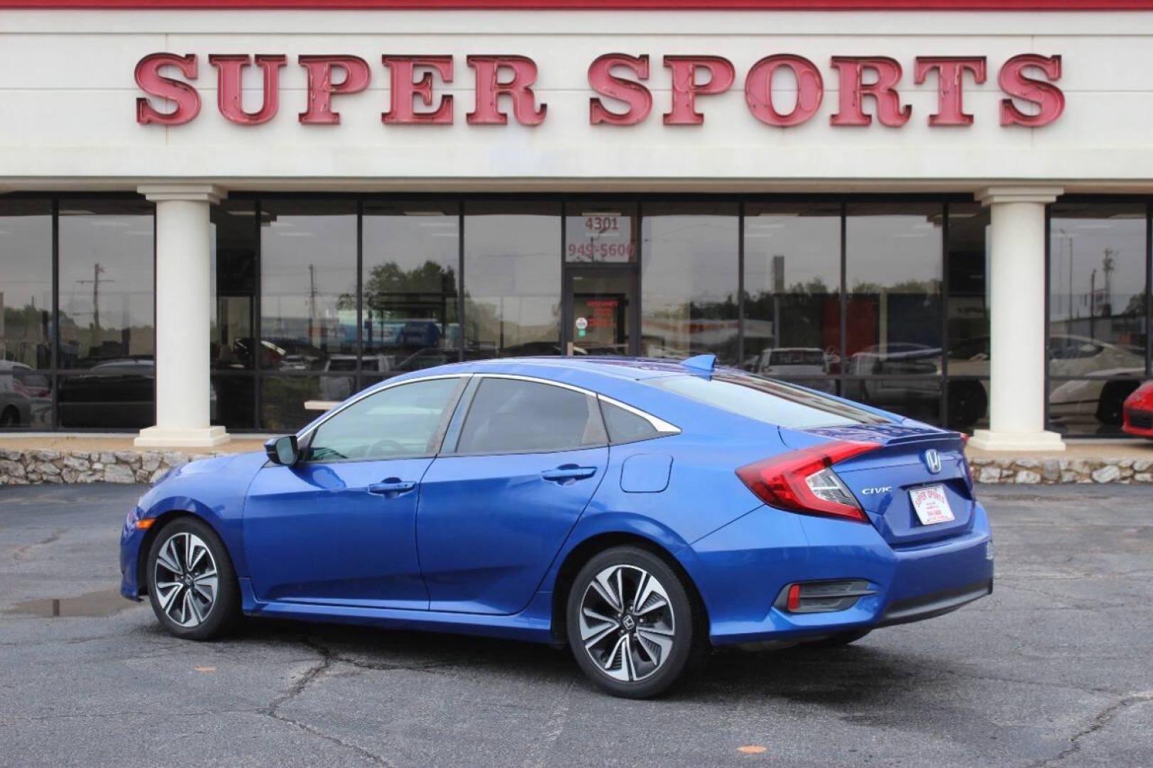 2016 Blue Honda Civic EX-T Sedan CVT (19XFC1F31GE) with an 1.5L L4 DOHC 16V TURBO engine, CVT transmission, located at 4301 NW 39th , Oklahoma City, OK, 73112, (405) 949-5600, 35.512135, -97.598671 - NO DRIVERS LICENCE NO-FULL COVERAGE INSURANCE-NO CREDIT CHECK. COME ON OVER TO SUPERSPORTS AND TAKE A LOOK AND TEST DRIVE. PLEASE GIVE US A CALL AT (405) 949-5600. NO LICENSIA DE MANEJAR- NO SEGURO DE COBERTURA TOTAL- NO VERIFICACCION DE CREDITO. POR FAVOR VENGAN A SUPERSPORTS, ECHE UN - Photo#5