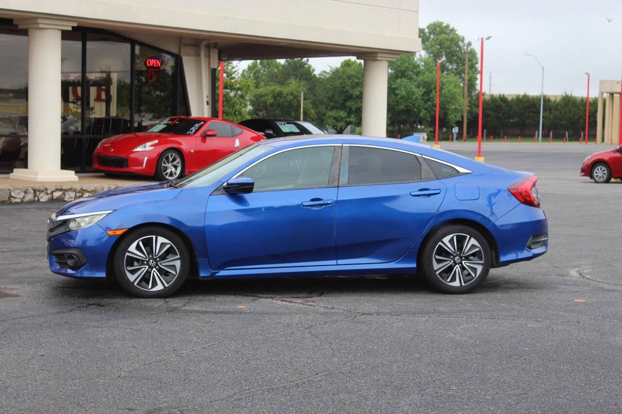2016 Blue Honda Civic EX-T Sedan CVT (19XFC1F31GE) with an 1.5L L4 DOHC 16V TURBO engine, CVT transmission, located at 4301 NW 39th , Oklahoma City, OK, 73112, (405) 949-5600, 35.512135, -97.598671 - NO DRIVERS LICENCE -NO FULL COVERAGE INSURANCE - NO CREDIT CHECK. COME ON OVER TO SUPERSPORTS, TAKE A LOOK AND TEST DRIVE. PLEASE GIVE US A CALL AT (405) 949-5600. NO LICENCIA DE CONDUCIR - NO SEGURO DE COBERTURA TOTAL - NO VERIFICACION DE CREDITO. VISITENOS EN SUPERSPORTS, MIRE NUESTRO - Photo#5