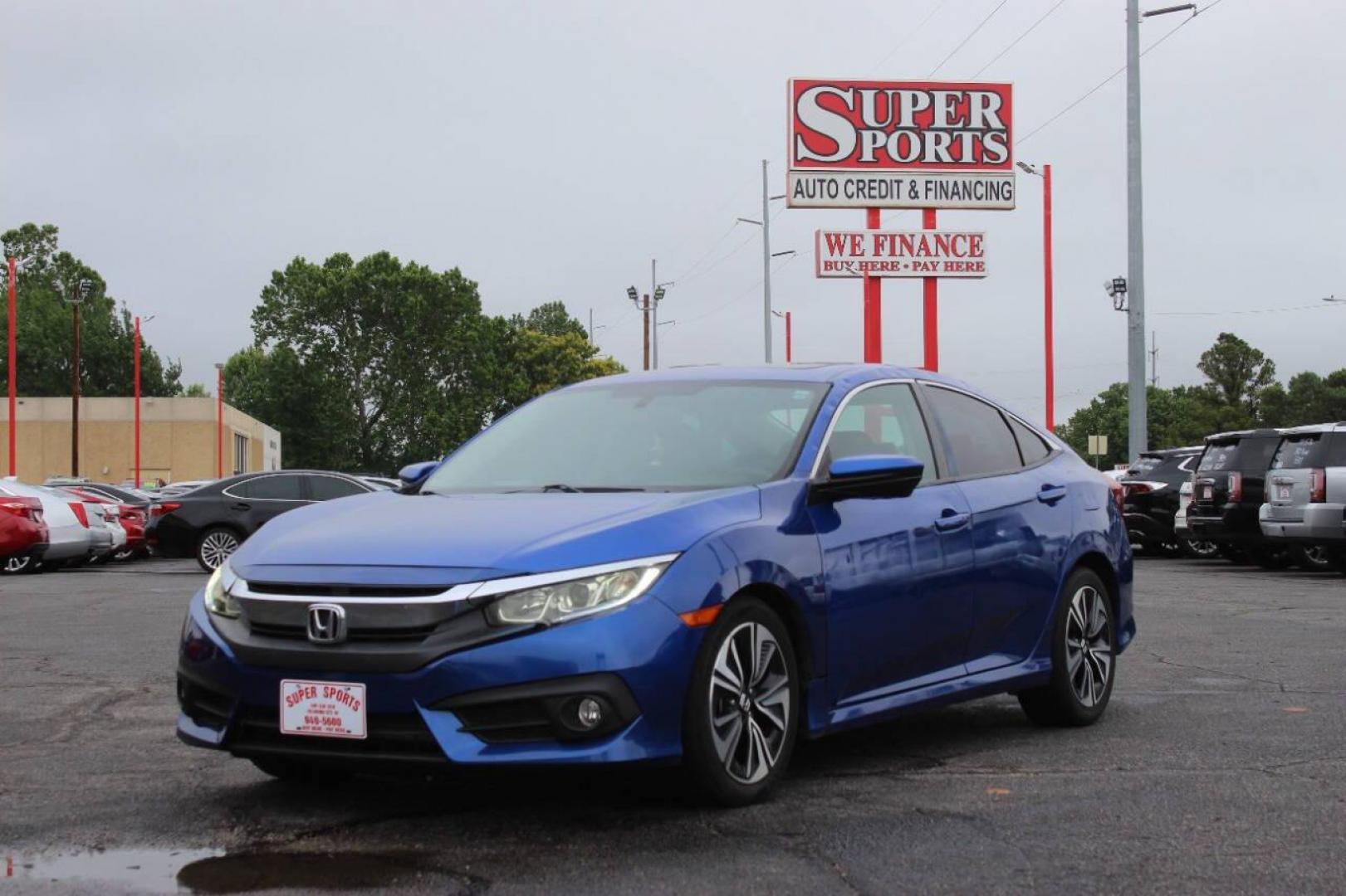 2016 Blue Honda Civic EX-T Sedan CVT (19XFC1F31GE) with an 1.5L L4 DOHC 16V TURBO engine, CVT transmission, located at 4301 NW 39th , Oklahoma City, OK, 73112, (405) 949-5600, 35.512135, -97.598671 - NO DRIVERS LICENCE NO-FULL COVERAGE INSURANCE-NO CREDIT CHECK. COME ON OVER TO SUPERSPORTS AND TAKE A LOOK AND TEST DRIVE. PLEASE GIVE US A CALL AT (405) 949-5600. NO LICENSIA DE MANEJAR- NO SEGURO DE COBERTURA TOTAL- NO VERIFICACCION DE CREDITO. POR FAVOR VENGAN A SUPERSPORTS, ECHE UN - Photo#7