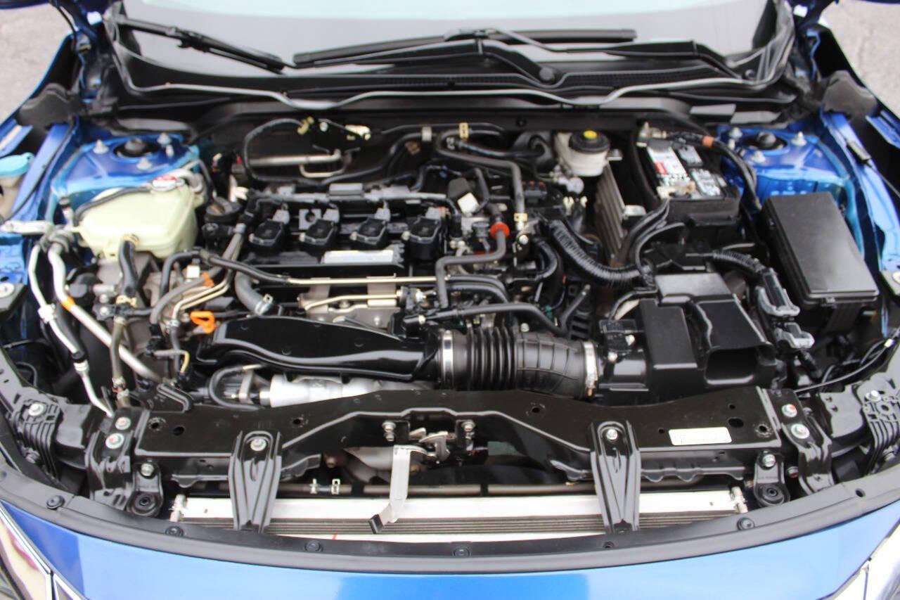 2016 Blue Honda Civic EX-T Sedan CVT (19XFC1F31GE) with an 1.5L L4 DOHC 16V TURBO engine, CVT transmission, located at 4301 NW 39th , Oklahoma City, OK, 73112, (405) 949-5600, 35.512135, -97.598671 - NO DRIVERS LICENCE -NO FULL COVERAGE INSURANCE - NO CREDIT CHECK. COME ON OVER TO SUPERSPORTS, TAKE A LOOK AND TEST DRIVE. PLEASE GIVE US A CALL AT (405) 949-5600. NO LICENCIA DE CONDUCIR - NO SEGURO DE COBERTURA TOTAL - NO VERIFICACION DE CREDITO. VISITENOS EN SUPERSPORTS, MIRE NUESTRO - Photo#7