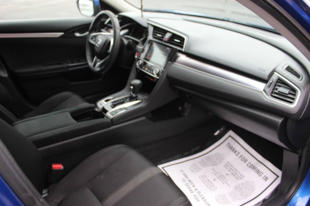 2016 Blue Honda Civic EX-T Sedan CVT (19XFC1F31GE) with an 1.5L L4 DOHC 16V TURBO engine, CVT transmission, located at 4301 NW 39th , Oklahoma City, OK, 73112, (405) 949-5600, 35.512135, -97.598671 - NO DRIVERS LICENCE -NO FULL COVERAGE INSURANCE - NO CREDIT CHECK. COME ON OVER TO SUPERSPORTS, TAKE A LOOK AND TEST DRIVE. PLEASE GIVE US A CALL AT (405) 949-5600. NO LICENCIA DE CONDUCIR - NO SEGURO DE COBERTURA TOTAL - NO VERIFICACION DE CREDITO. VISITENOS EN SUPERSPORTS, MIRE NUESTRO - Photo#8