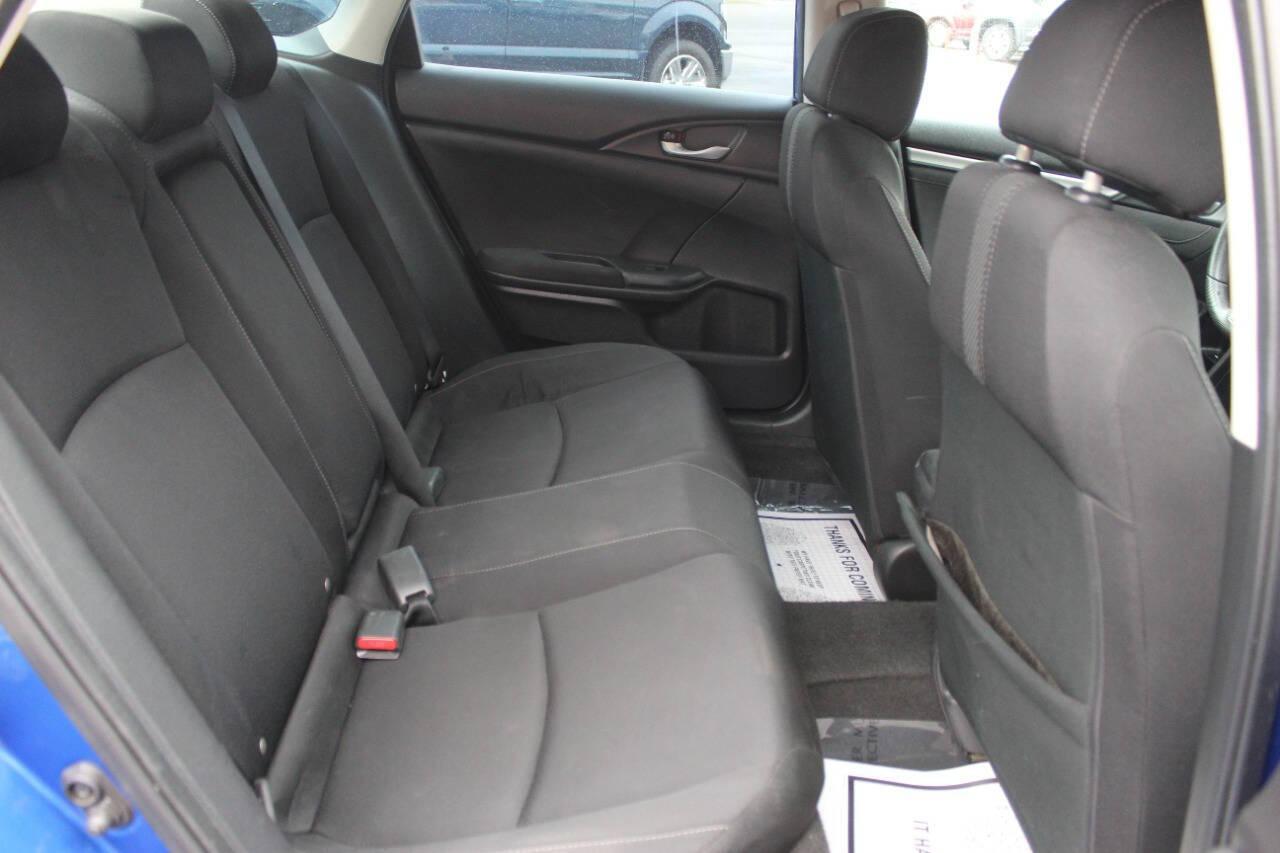 2016 Blue Honda Civic EX-T Sedan CVT (19XFC1F31GE) with an 1.5L L4 DOHC 16V TURBO engine, CVT transmission, located at 4301 NW 39th , Oklahoma City, OK, 73112, (405) 949-5600, 35.512135, -97.598671 - NO DRIVERS LICENCE -NO FULL COVERAGE INSURANCE - NO CREDIT CHECK. COME ON OVER TO SUPERSPORTS, TAKE A LOOK AND TEST DRIVE. PLEASE GIVE US A CALL AT (405) 949-5600. NO LICENCIA DE CONDUCIR - NO SEGURO DE COBERTURA TOTAL - NO VERIFICACION DE CREDITO. VISITENOS EN SUPERSPORTS, MIRE NUESTRO - Photo#10