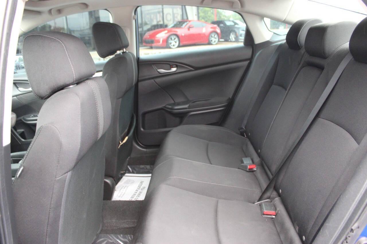 2016 Blue Honda Civic EX-T Sedan CVT (19XFC1F31GE) with an 1.5L L4 DOHC 16V TURBO engine, CVT transmission, located at 4301 NW 39th , Oklahoma City, OK, 73112, (405) 949-5600, 35.512135, -97.598671 - NO DRIVERS LICENCE -NO FULL COVERAGE INSURANCE - NO CREDIT CHECK. COME ON OVER TO SUPERSPORTS, TAKE A LOOK AND TEST DRIVE. PLEASE GIVE US A CALL AT (405) 949-5600. NO LICENCIA DE CONDUCIR - NO SEGURO DE COBERTURA TOTAL - NO VERIFICACION DE CREDITO. VISITENOS EN SUPERSPORTS, MIRE NUESTRO - Photo#13